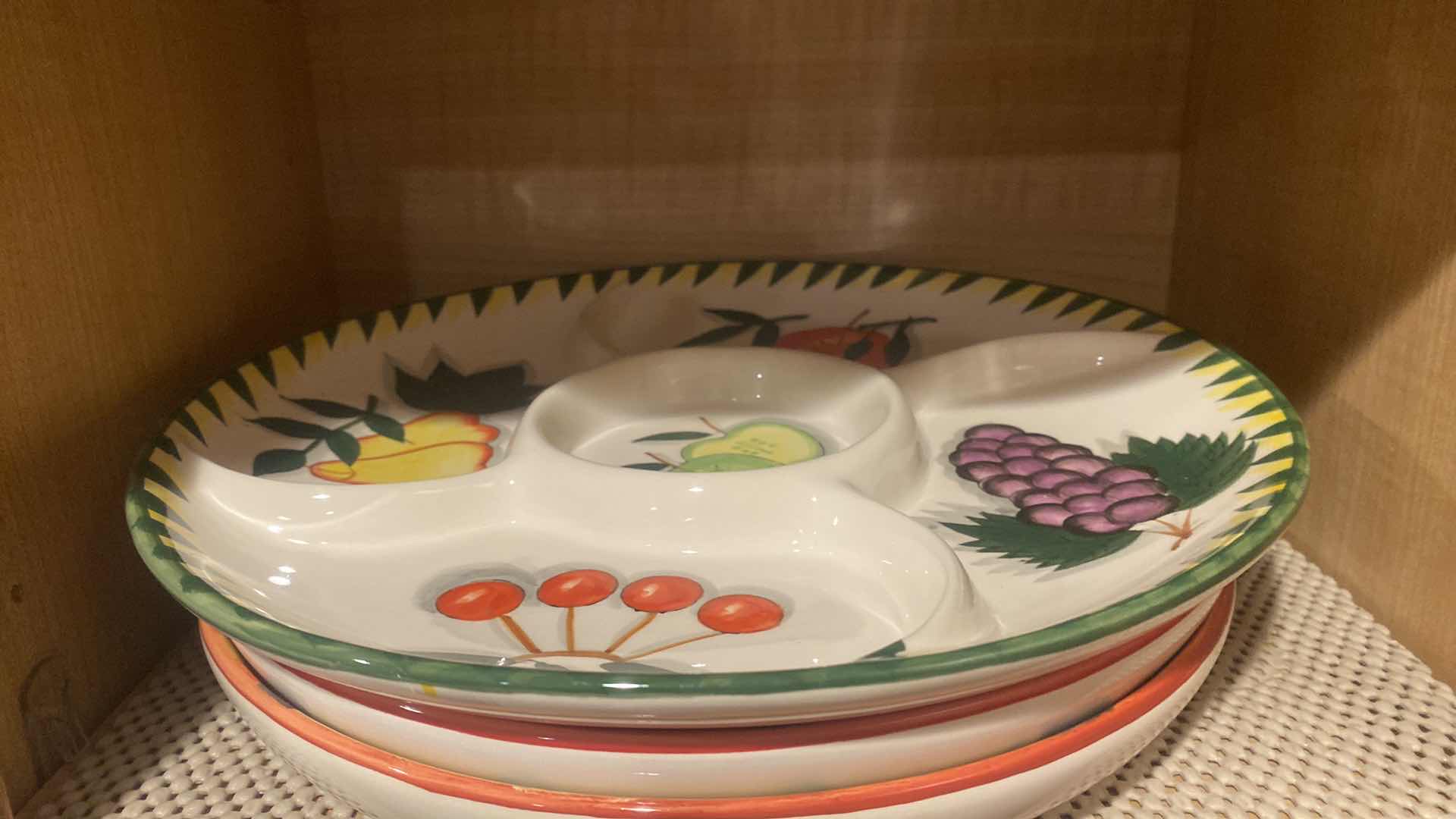 Photo 1 of CONTENTS OF 2 SHELVES KITCHEN CABINET- PLASTIC MARGUERITA GLASSES & PLATTERS