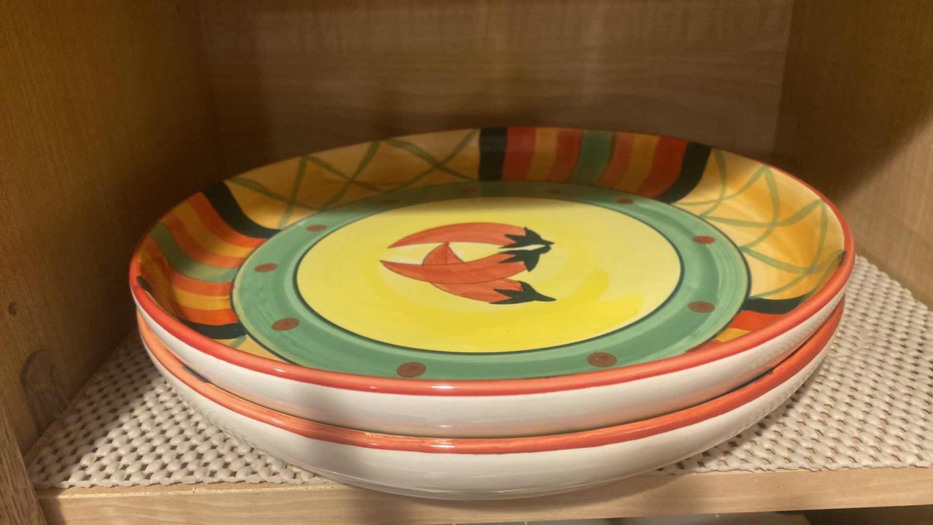 Photo 1 of CONTENTS OF 2 SHELVES KITCHEN CABINET- PLASTIC MARGUERITA GLASSES & PLATTERS