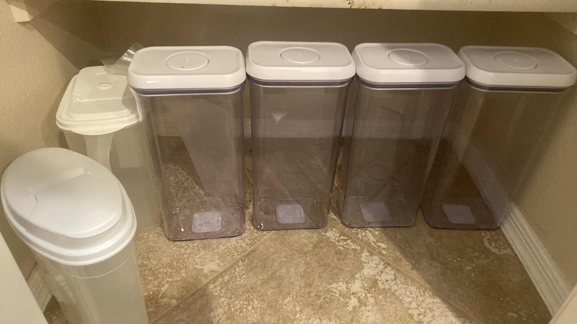 Photo 1 of 2 - BOTTOM SHELFS PANTRY - STORAGE PLASTICS & CUPS