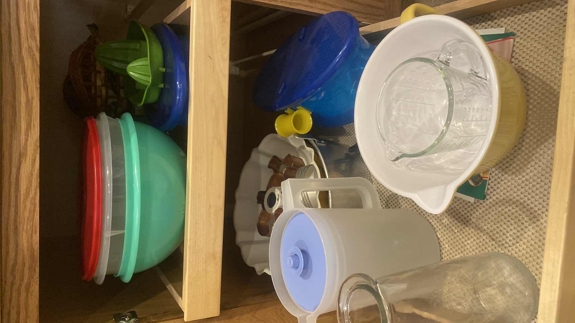 Photo 1 of CONTENTS KITCHEN CABINET - BUNDT & ANGEL FOOD PANS & PLASTIC WARE