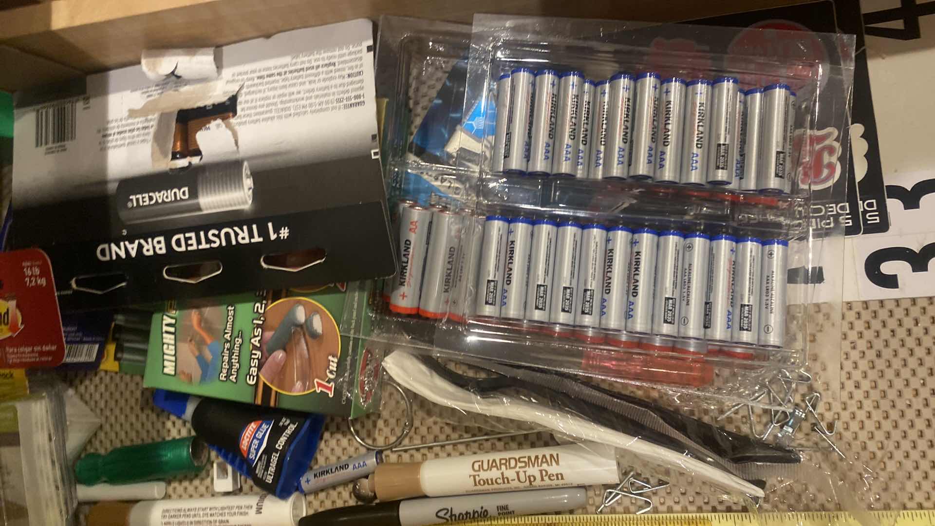 Photo 1 of KITCHEN JUNK DRAWER - BATTERIES LIGHTERS SCISSORS & MORE