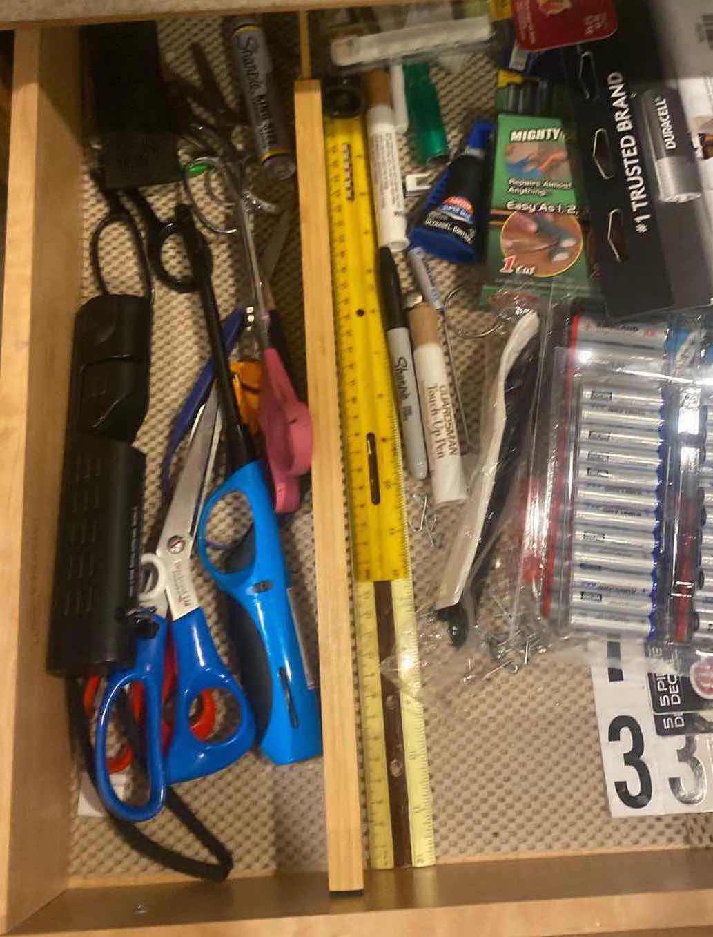 Photo 1 of KITCHEN JUNK DRAWER - BATTERIES LIGHTERS SCISSORS & MORE