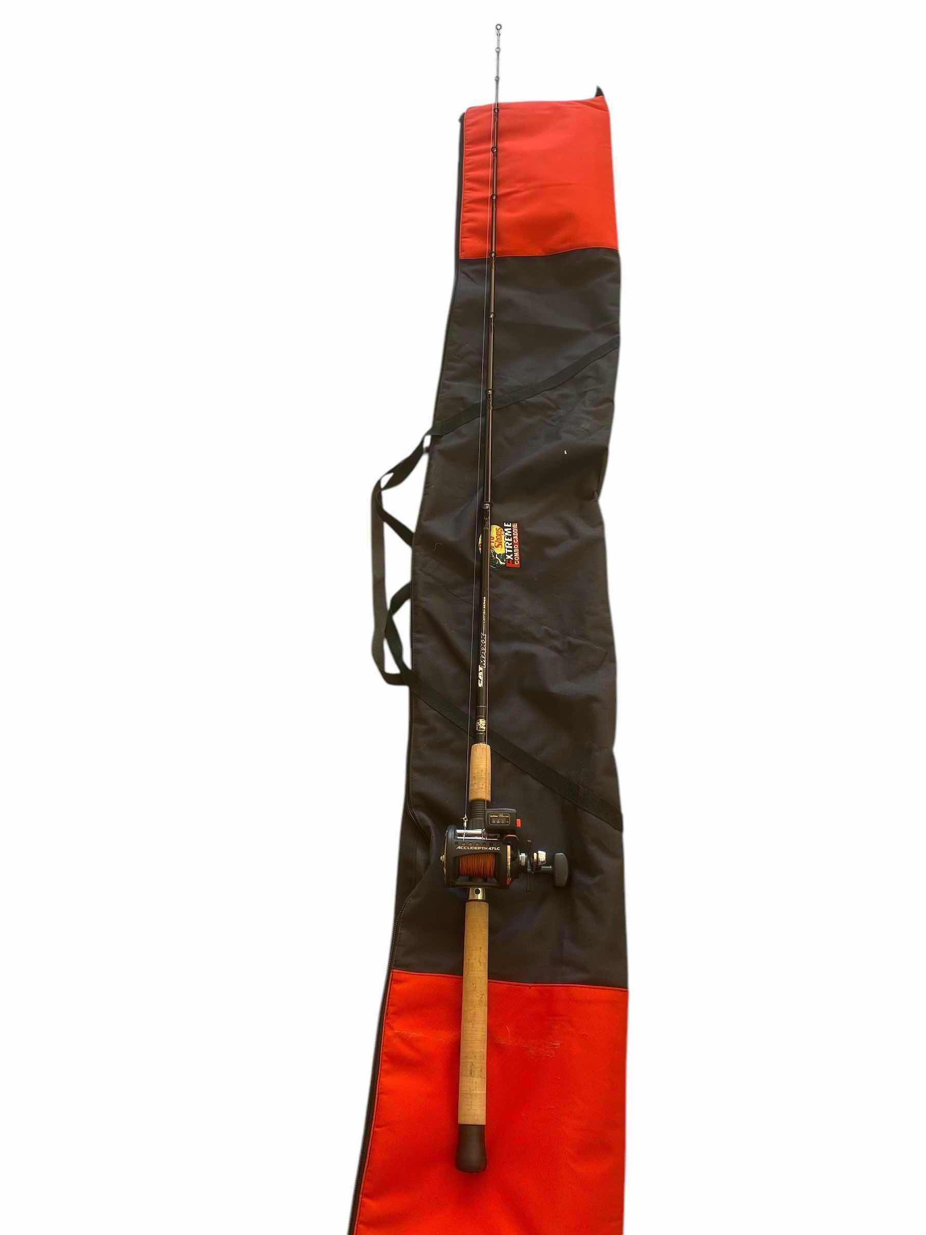 Photo 1 of CAT MAXX FISHING ROD WITH DAIWA REEL & BAG ROD 70”