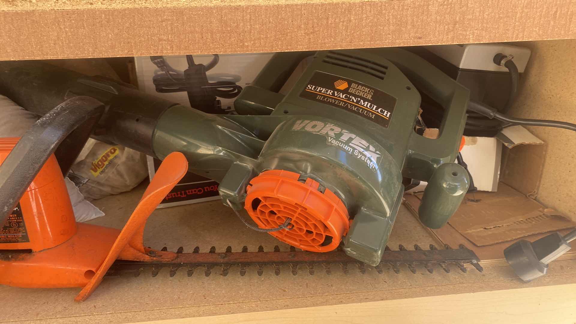 Photo 1 of CONTENTS GARAGE CABINET - HEDGE TRIMMERS & MORE