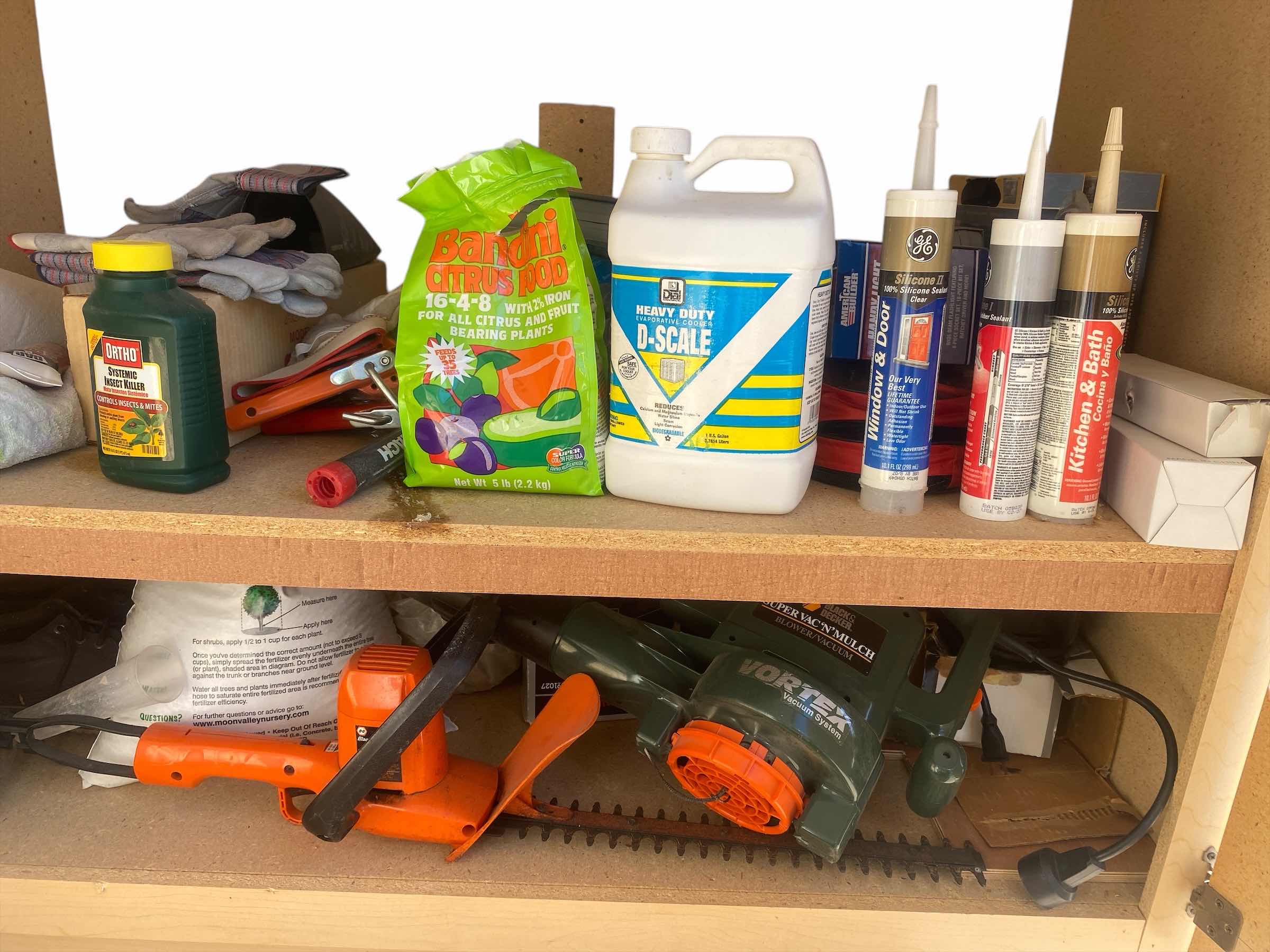 Photo 1 of CONTENTS GARAGE CABINET - HEDGE TRIMMERS & MORE