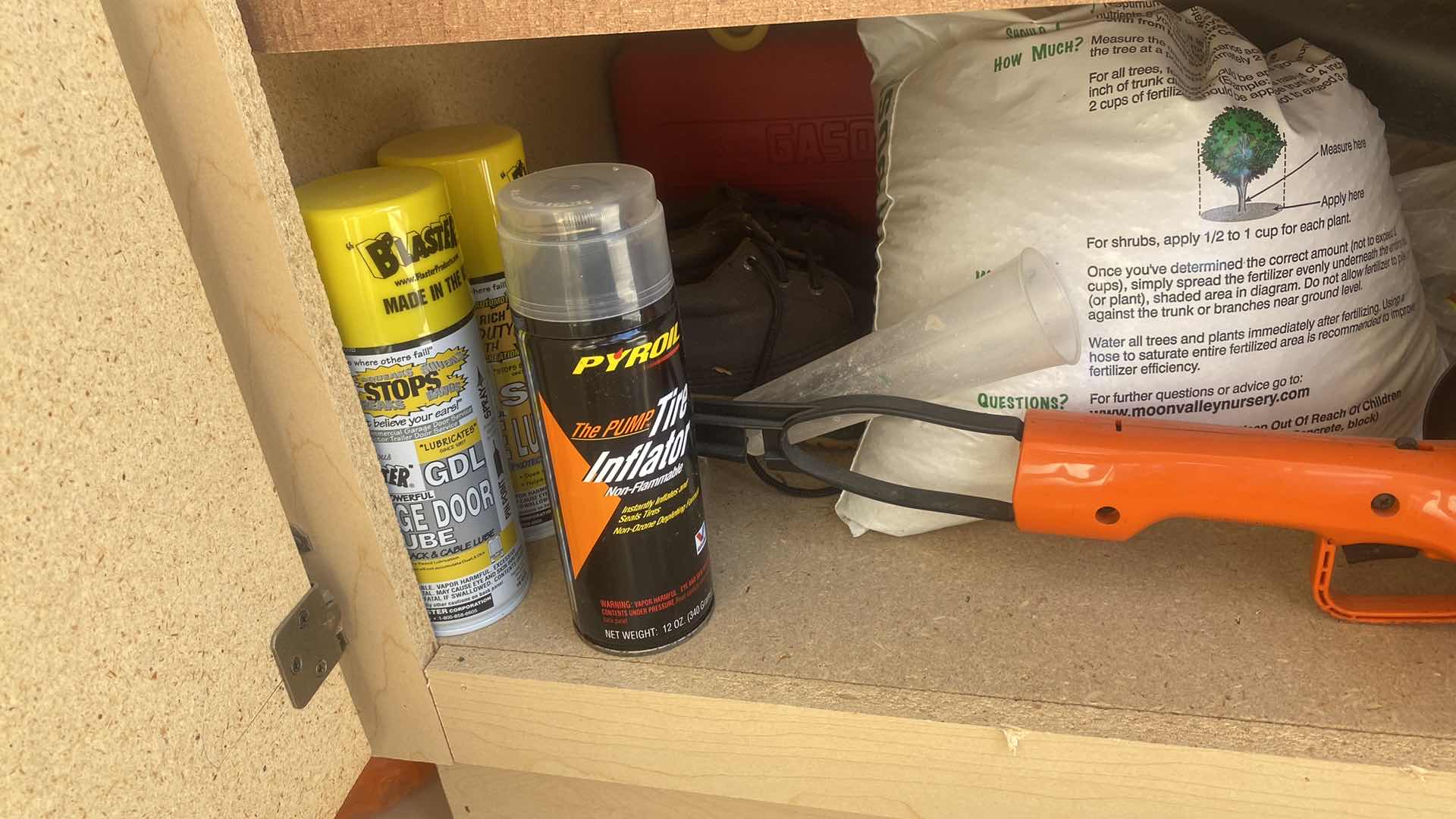 Photo 1 of CONTENTS GARAGE CABINET - HEDGE TRIMMERS & MORE