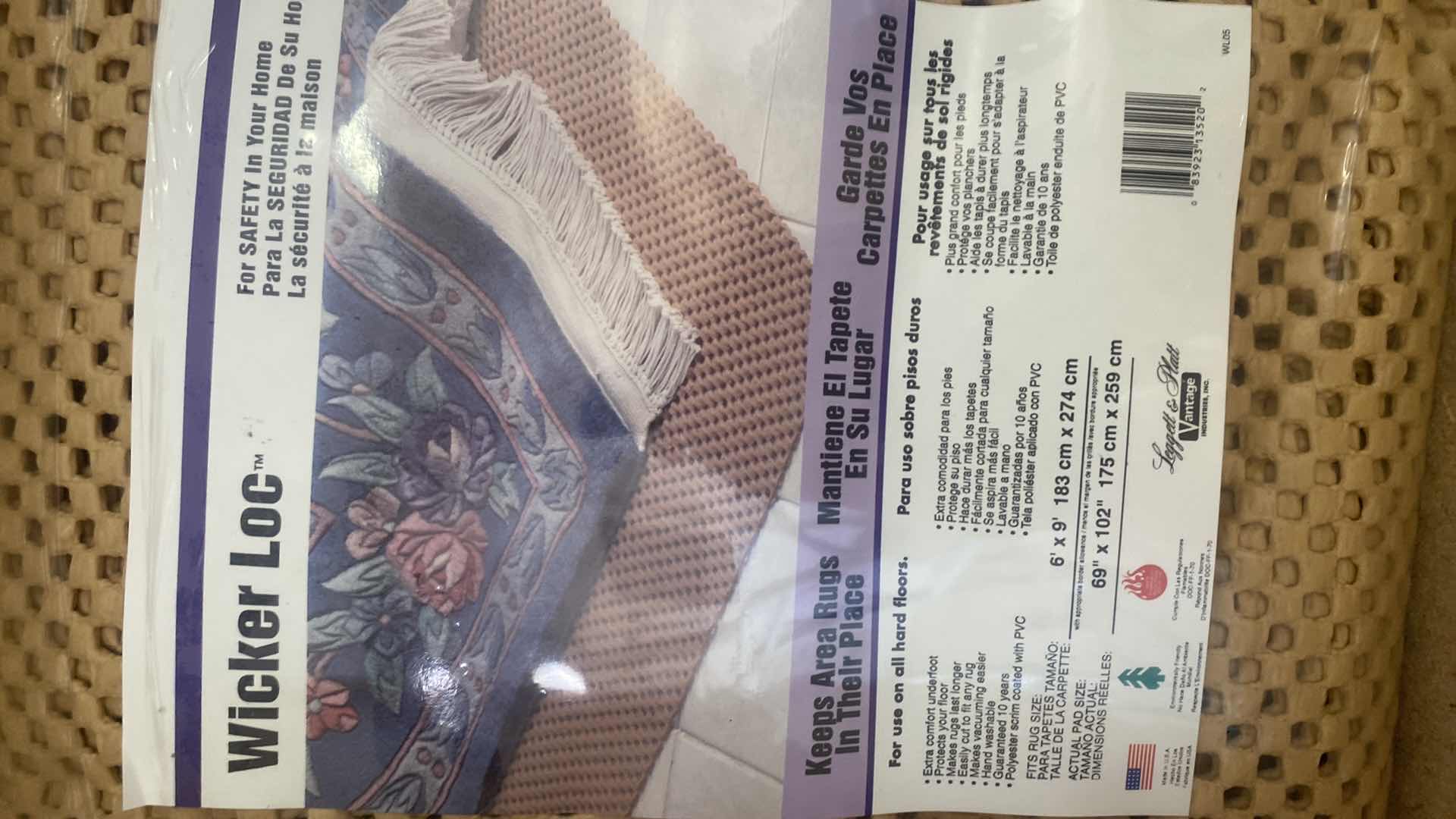 Photo 1 of CONTENTS OF CABINET - 6 LIGHT BULBS & NEW RUG PAD 6’ x 9’ & APPLIANCE ROLLERS