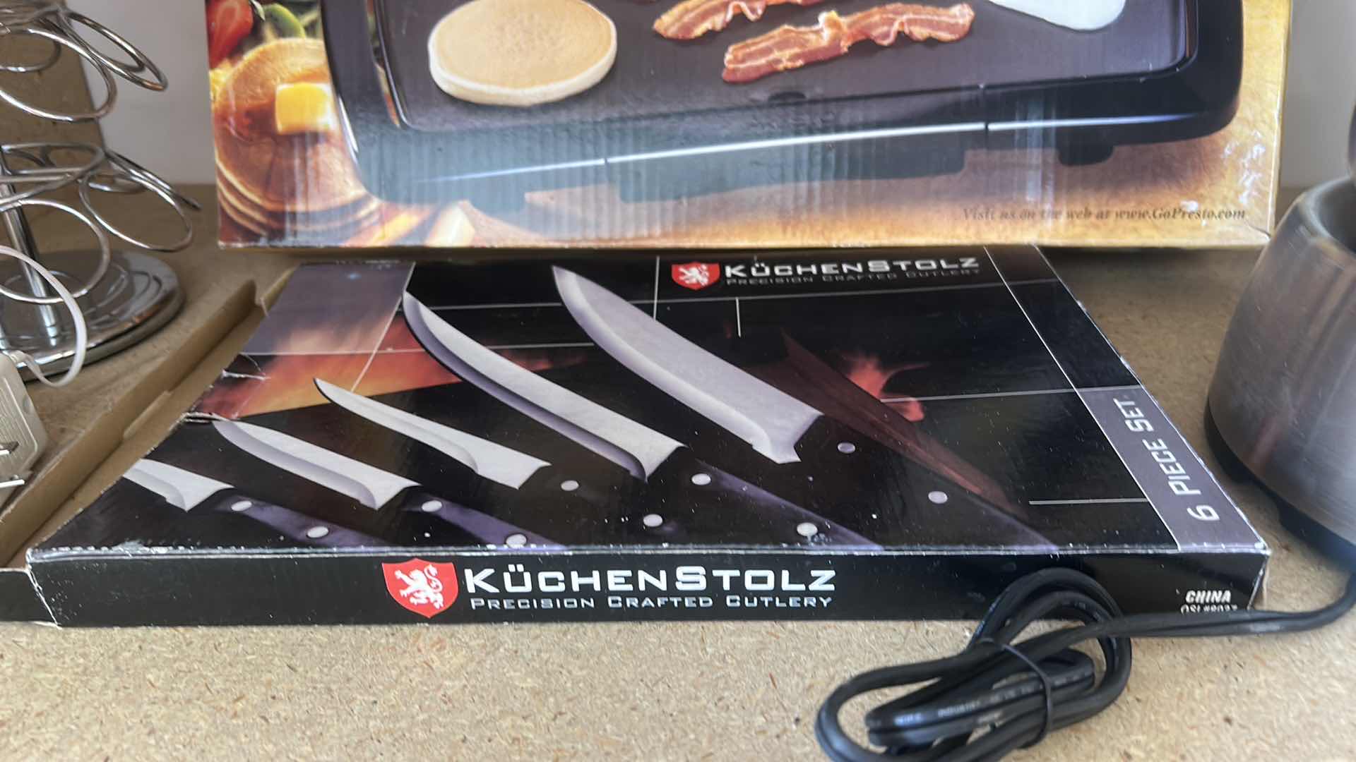 Photo 1 of CONTENTS ON SHELF - PRESTO GRIDDLE, FONDUE POT, KNIVES AND MORE