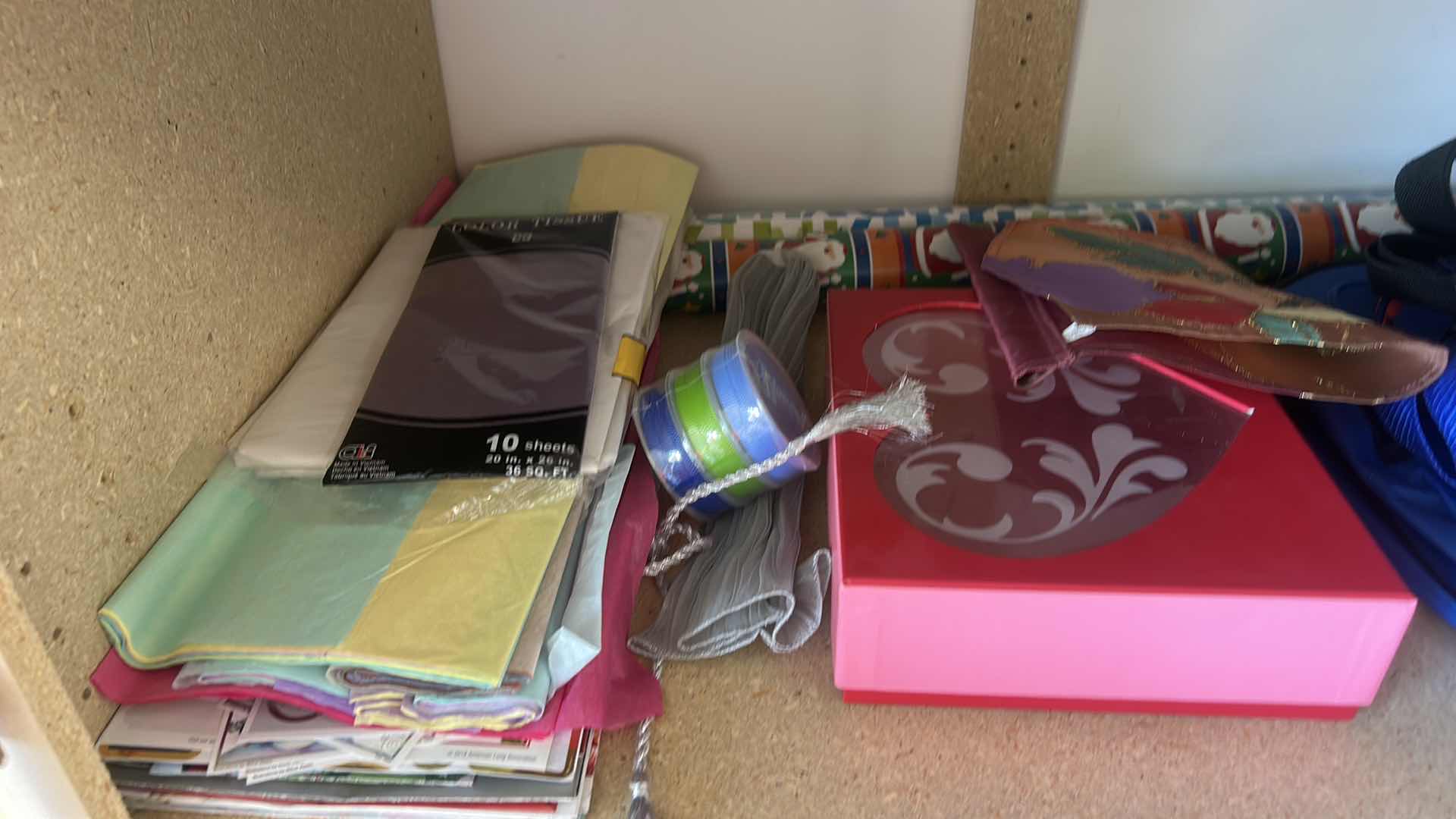 Photo 1 of CONTENTS OF TWO SHELVES- WRAPPING AND HOLIDAY ITEMS
