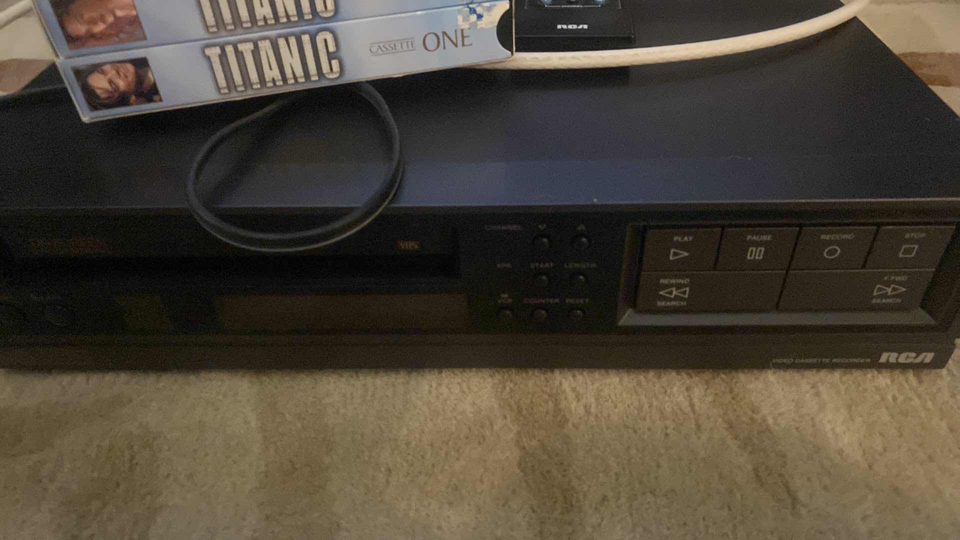 Photo 1 of RCA VHS PLAYER WITH REMOTE & TITANIC MOVIE