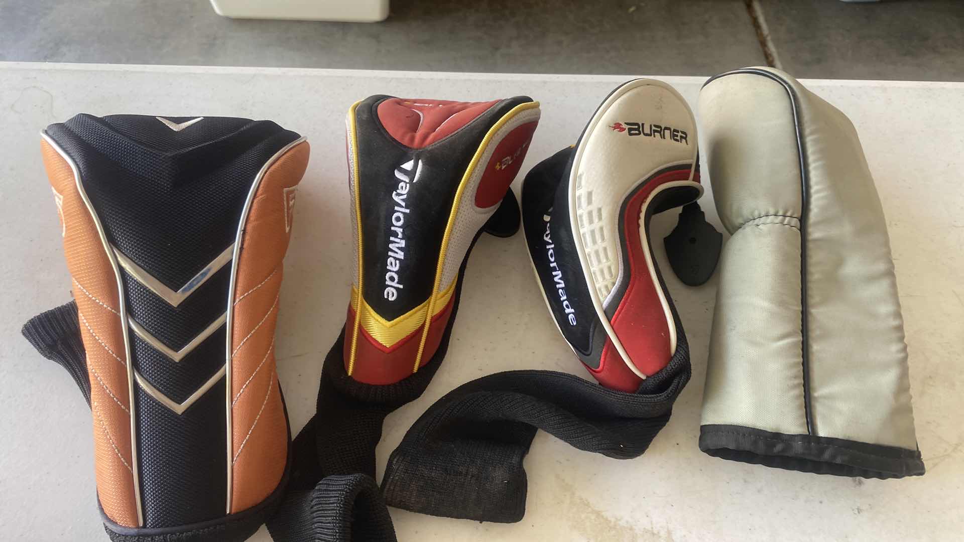 Photo 1 of GOLF BALLS & CLUB COVERS