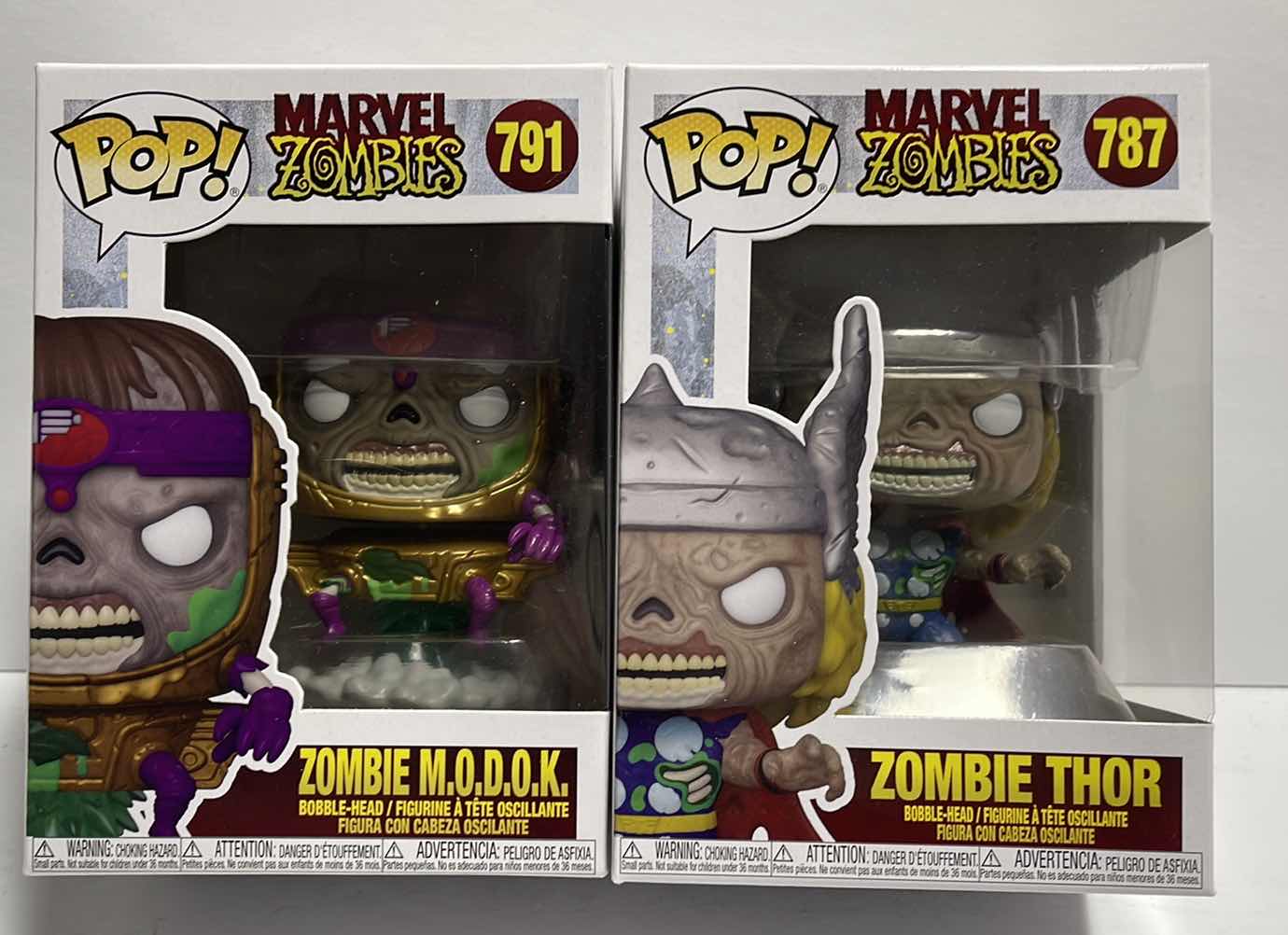 View 1 of NIB FUNKO POP MARVEL
ZOMBIES SERIES "ZOMBIE THOR & ZOMBIE M.O.O.K. TOTAL RETAIL PRICE $23.00