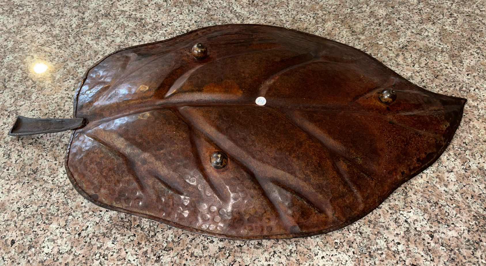 Photo 1 of FLORAL ARRANGEMENT & HAMMERED METAL DECORATIVE LEAF PLATE 26.25” x 14.5” (FLORAL ARRANGEMENT IS H32”)