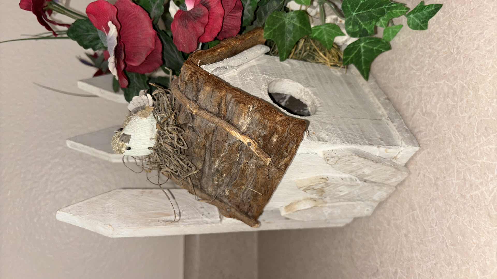 Photo 1 of SHABBY CHIC PANSY W IVY IN BIRDHOUSE FLORAL ARRANGEMENT 5.5” X 11.5” H9.25”