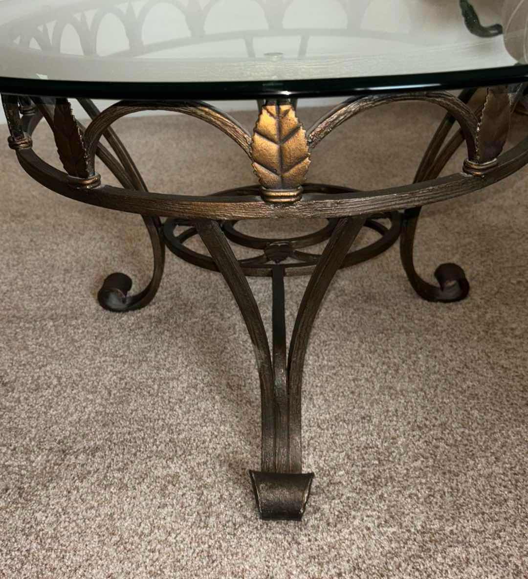 Photo 1 of TARNISHED BRONZE LEAF WROUGHT IRON COFFEE TABLE W OVAL GLASS TOP 31.75” X 47.75” H18”