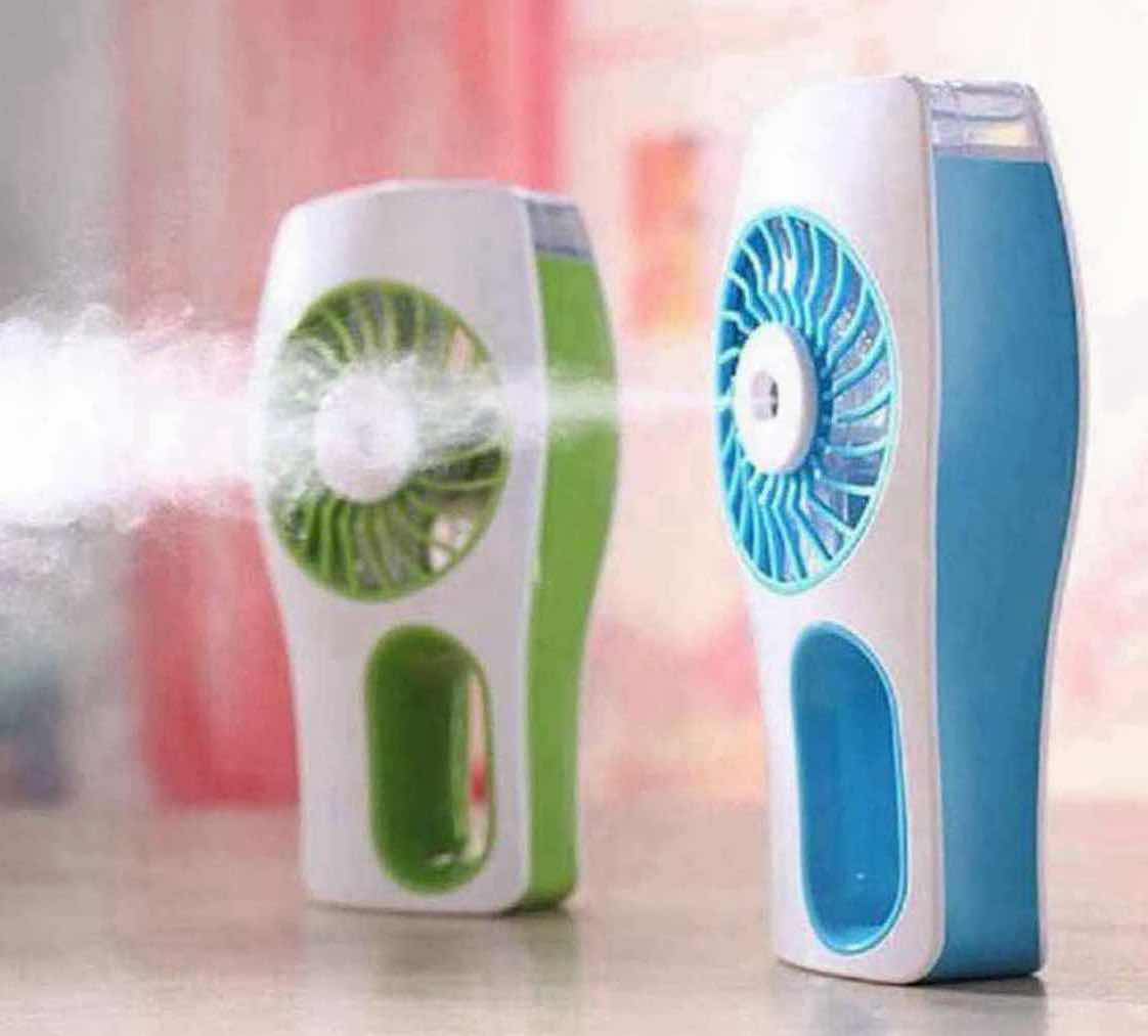 Photo 1 of JX HANDHELD MISTING FAN, MINI USB RECHARGEABLE BATTERY OPERATED PORTABLE PERSONAL FAN W SPRAY BOTTLE