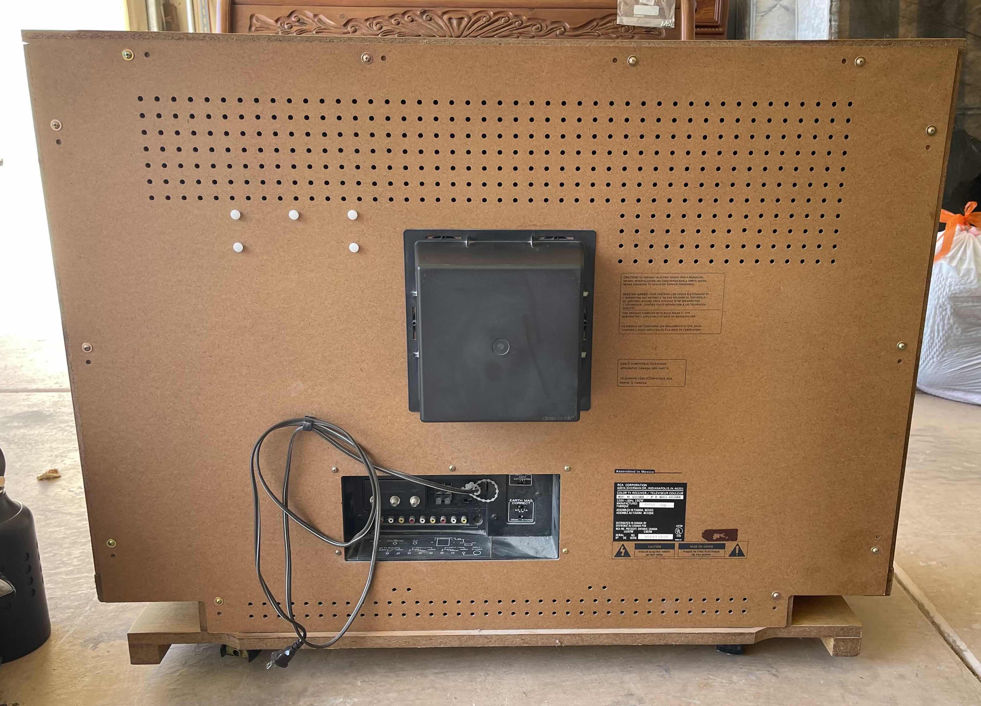 Photo 1 of RCA 32” COLORTRAK 2000 STEREO MONITOR CONSOLE WITH WHEELS, CONSOLE 15” X 42” H35” (MODEL G31150CK)