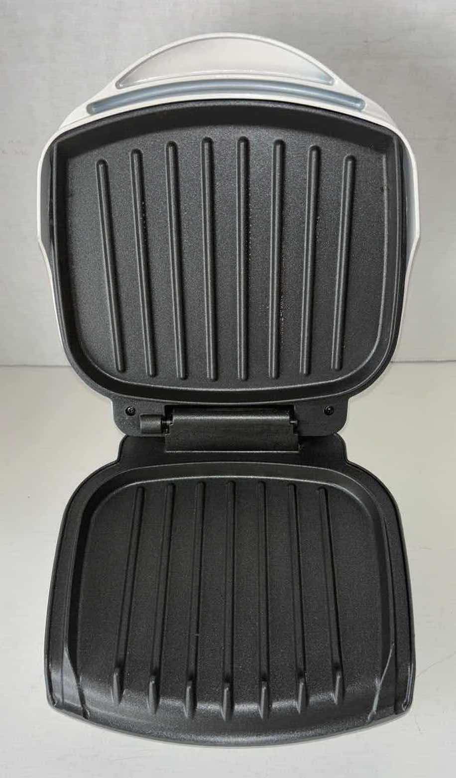 Photo 1 of GEORGE FOREMAN GRILLING MACHINE 8.75” X 9.5” H4.5”