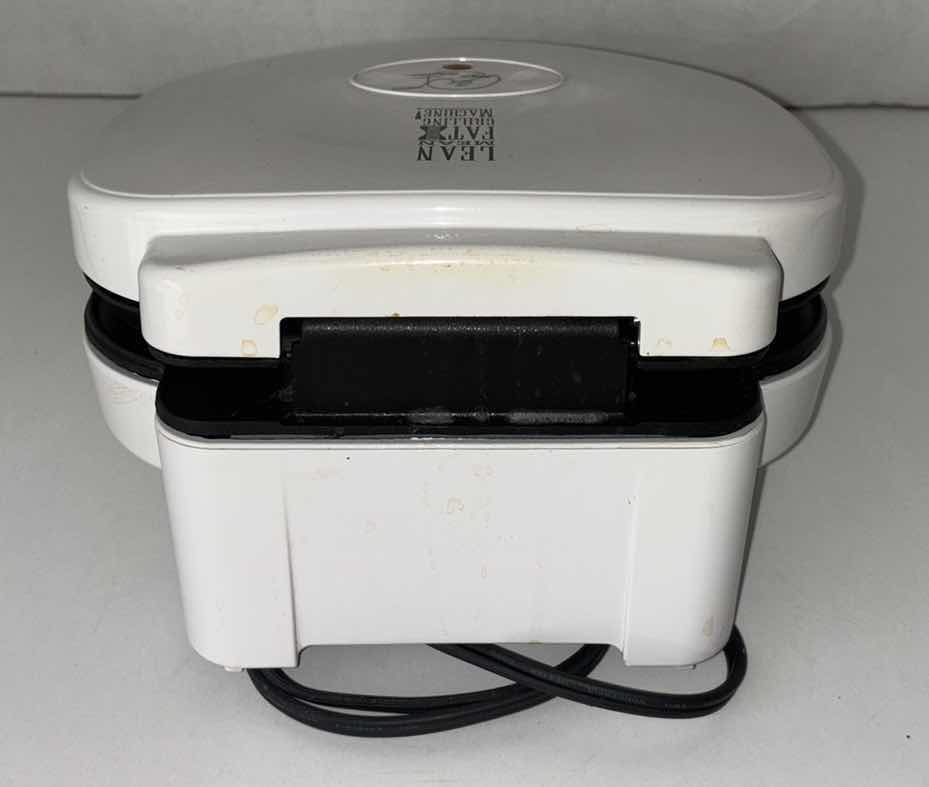 Photo 1 of GEORGE FOREMAN GRILLING MACHINE 8.75” X 9.5” H4.5”