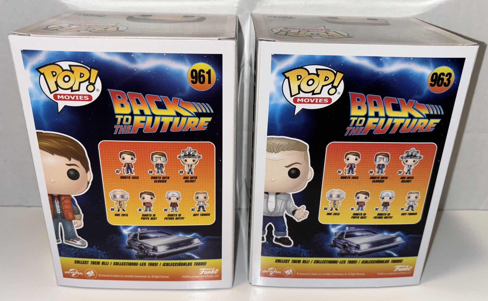 Photo 1 of NEW 2-PACK FUNKO POP! MOVIES VINYL FIGURE, BACK TO THE FUTURE #961 “MARTY IN PUFFY VEST” & #963 “BIFF TANNEN”