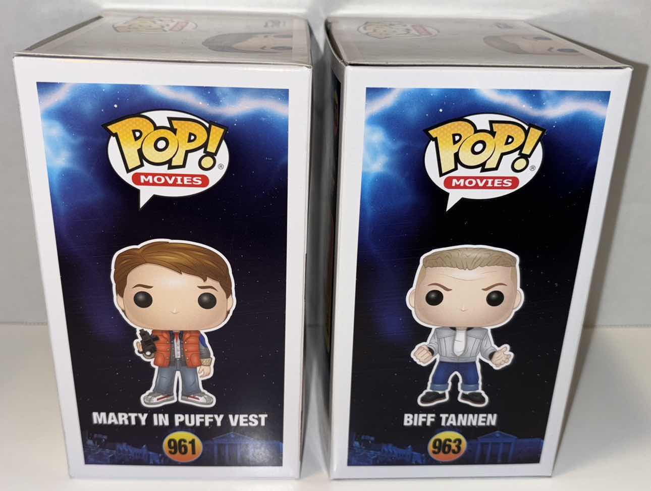 Photo 1 of NEW 2-PACK FUNKO POP! MOVIES VINYL FIGURE, BACK TO THE FUTURE #961 “MARTY IN PUFFY VEST” & #963 “BIFF TANNEN”