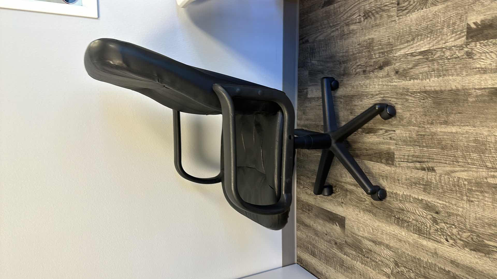 Photo 1 of BLACK SWIVEL OFFICE CHAIR 