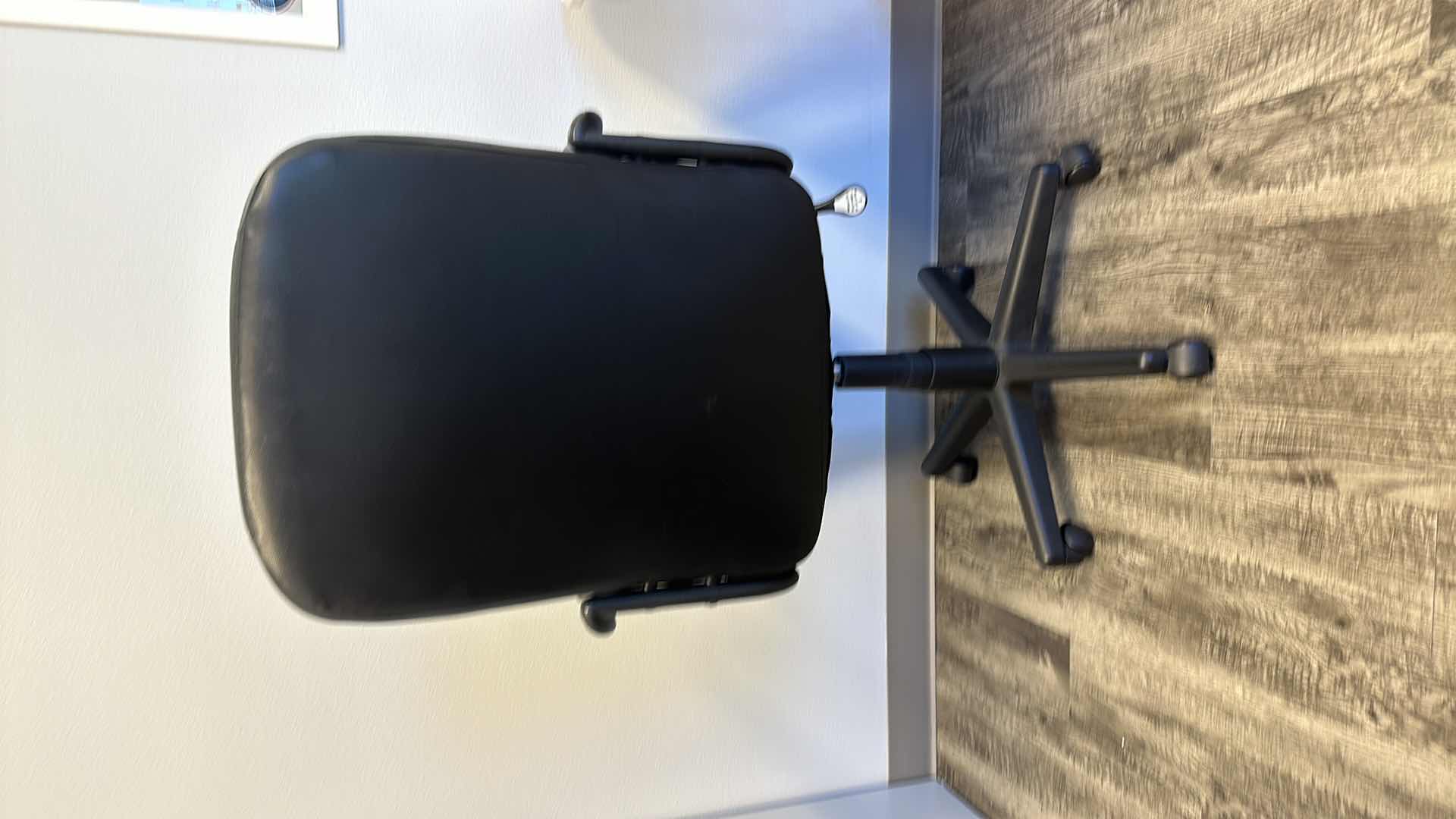 Photo 1 of BLACK SWIVEL OFFICE CHAIR 