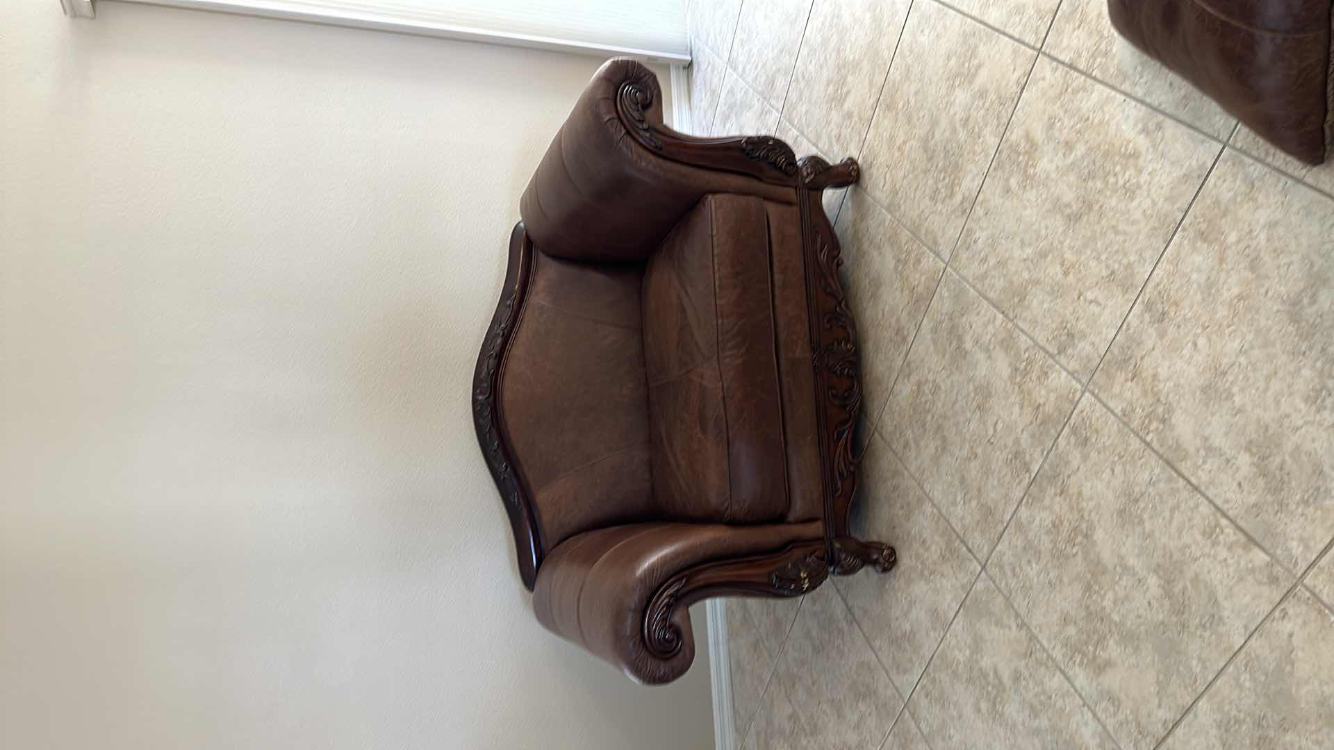 View 8 of BROWN LEATHER W ORNATE CHERRY TRIM OVERSIZED ARM CHAIR