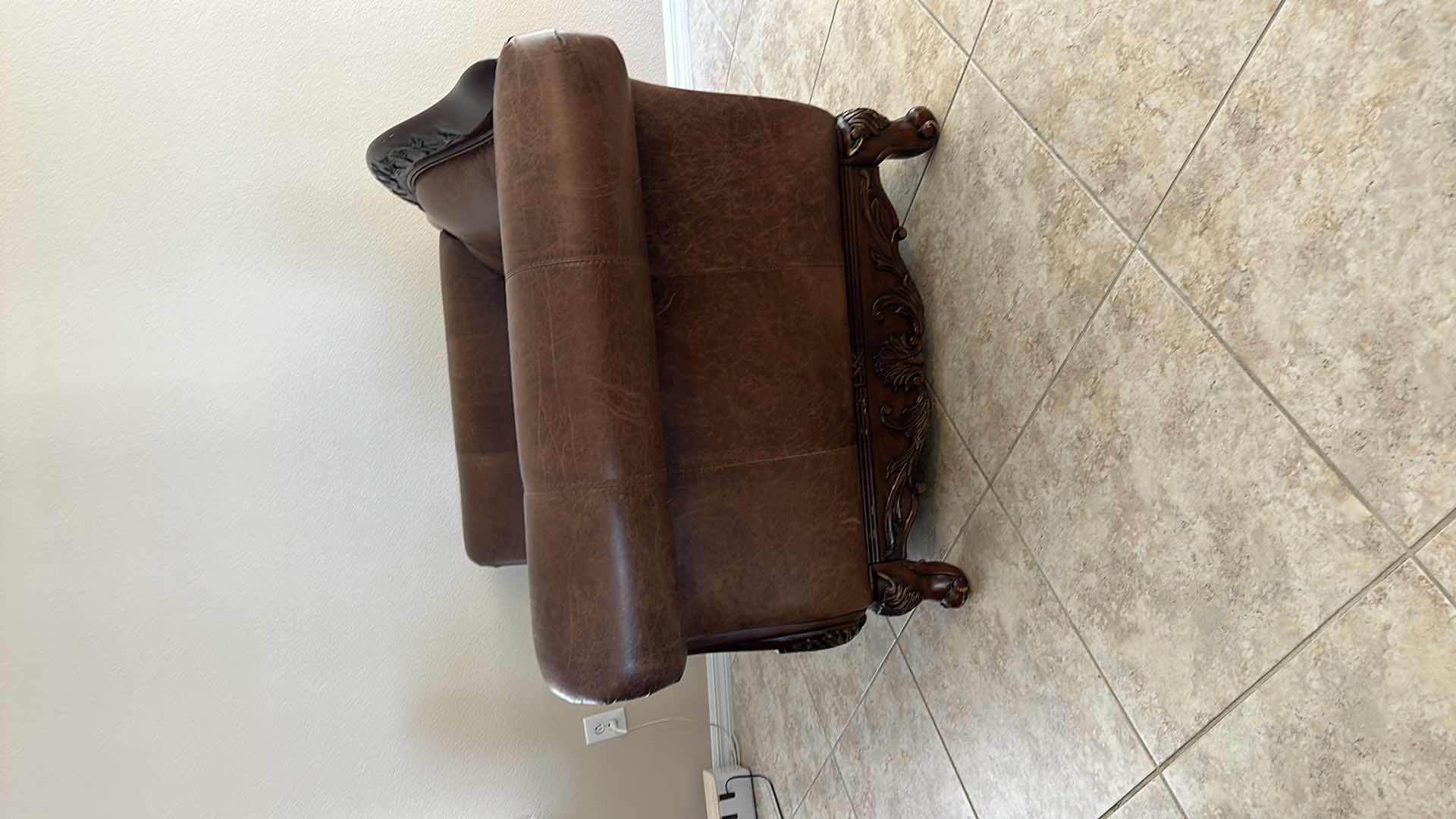 View 3 of BROWN LEATHER W ORNATE CHERRY TRIM OVERSIZED ARM CHAIR