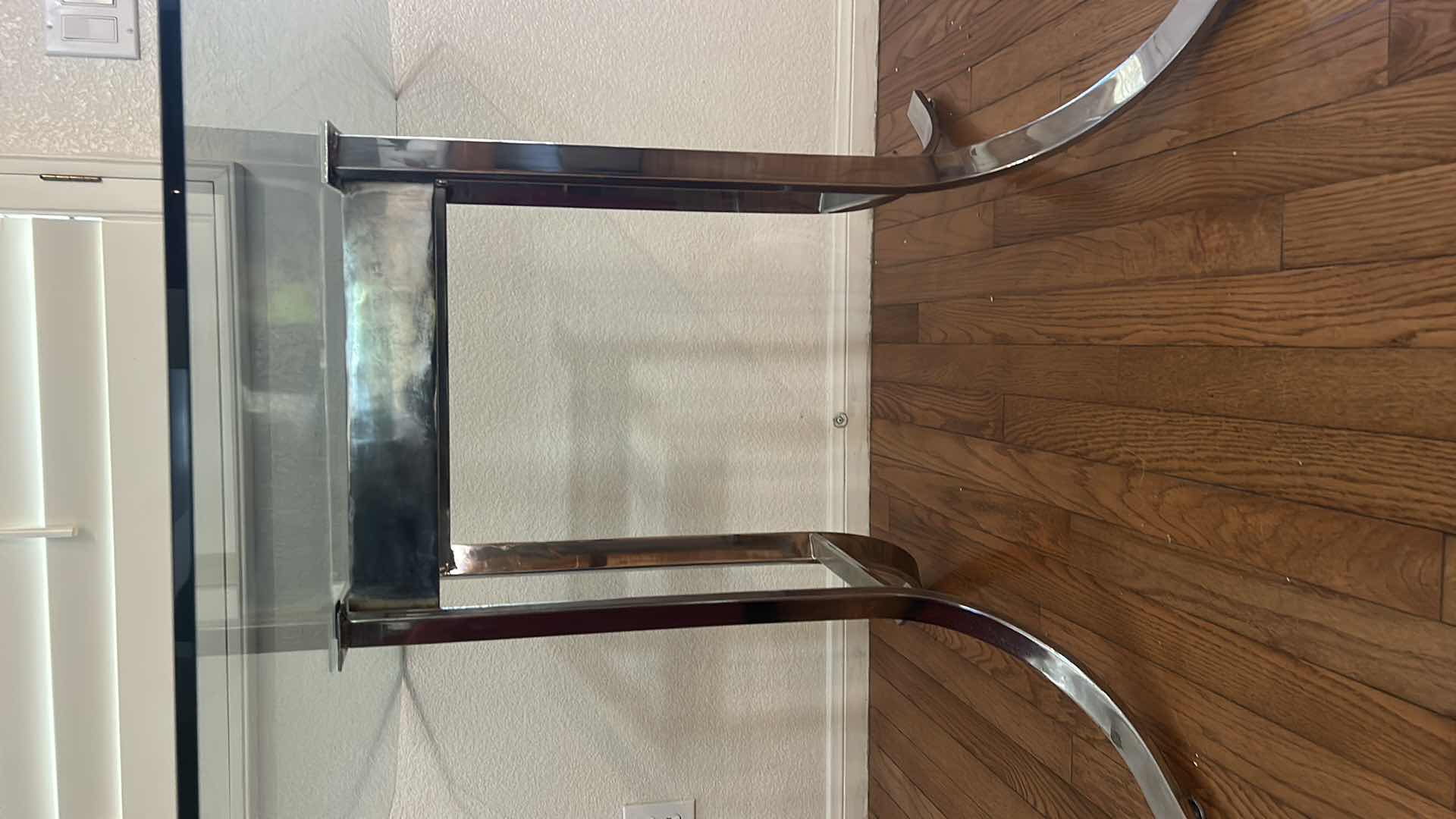 Photo 1 of CHROME AND GLASS DINING ROOM TABLE 42” x 42” x 28 1/2”
