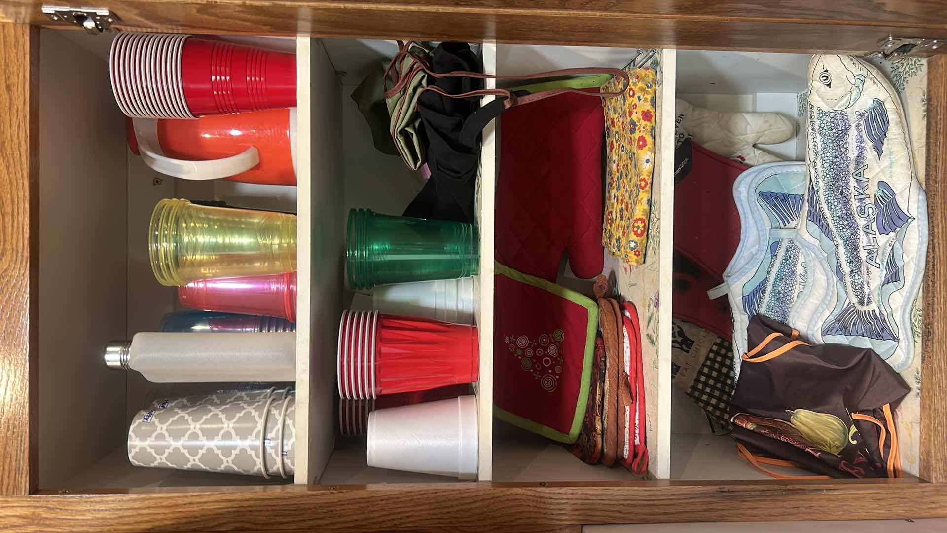 Photo 1 of CONTENTS OF CABINET IN KITCHEN