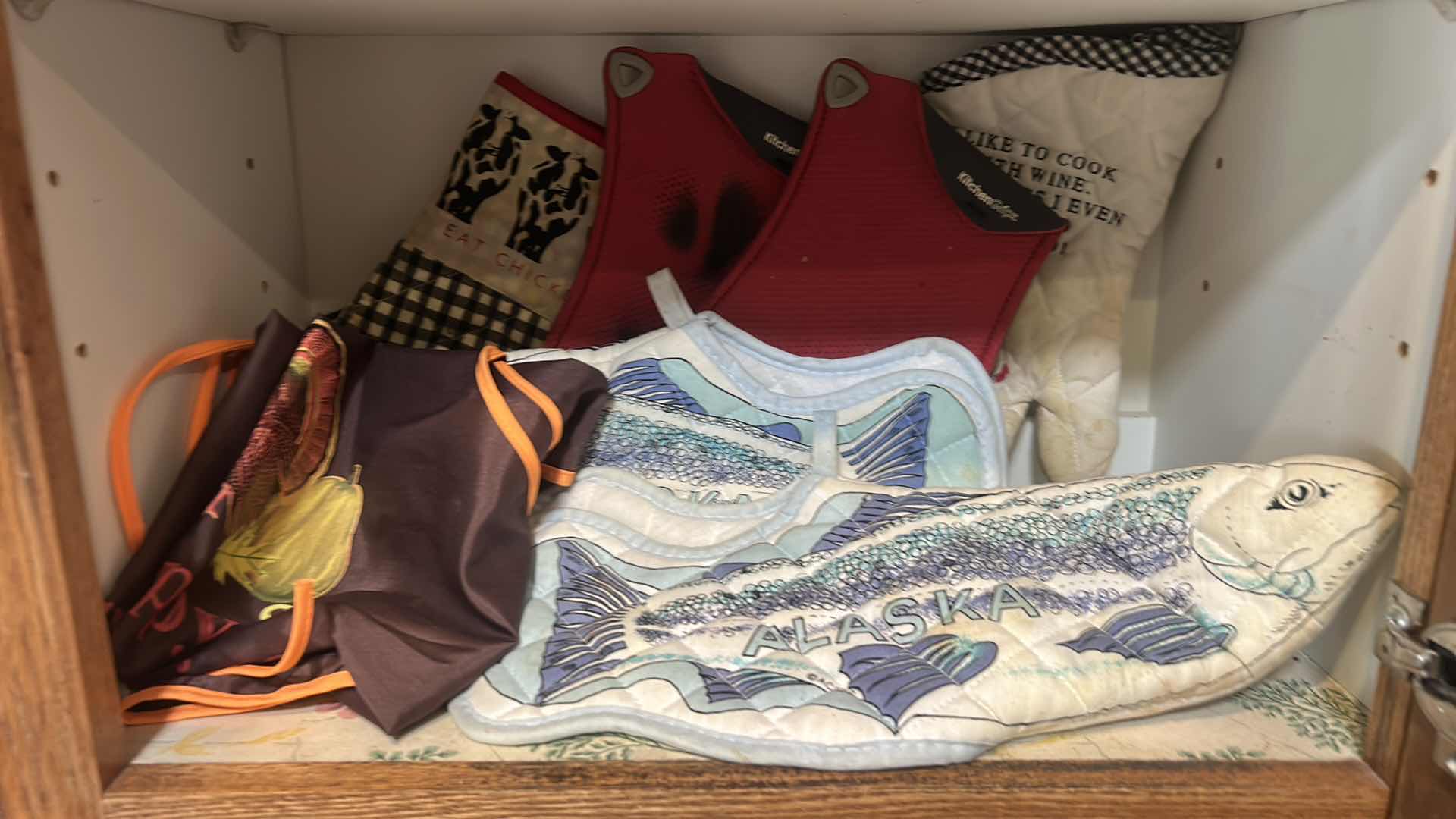 Photo 1 of CONTENTS OF CABINET IN KITCHEN