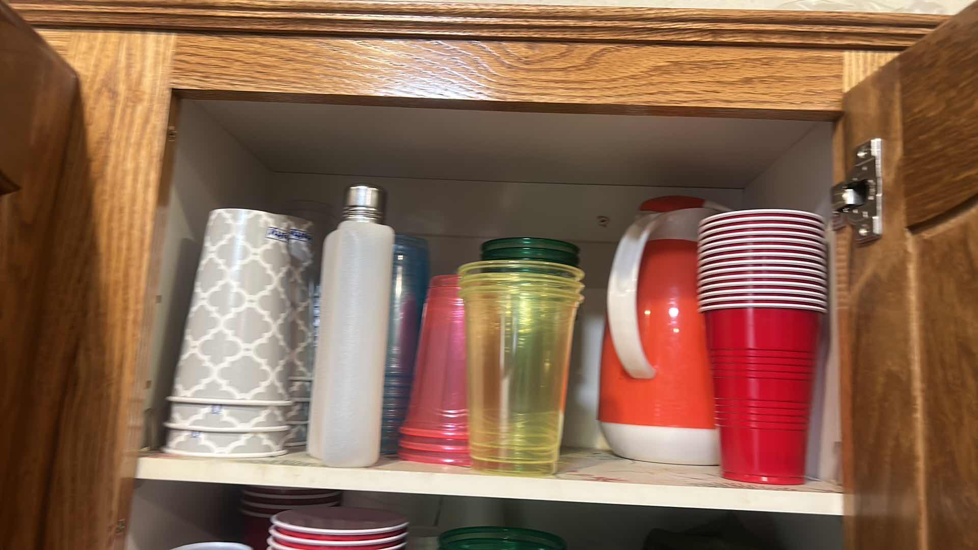 Photo 1 of CONTENTS OF CABINET IN KITCHEN