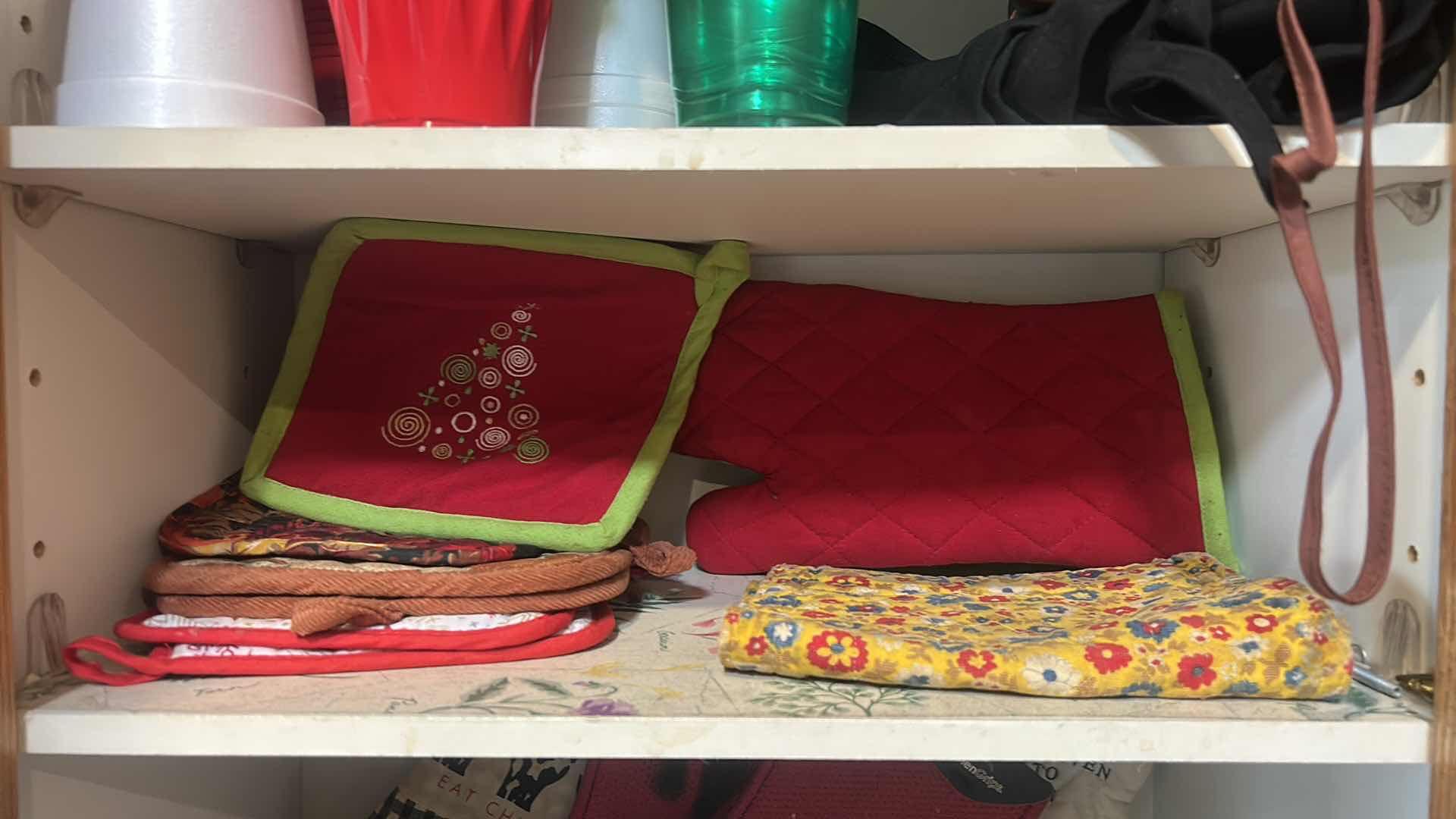 Photo 1 of CONTENTS OF CABINET IN KITCHEN