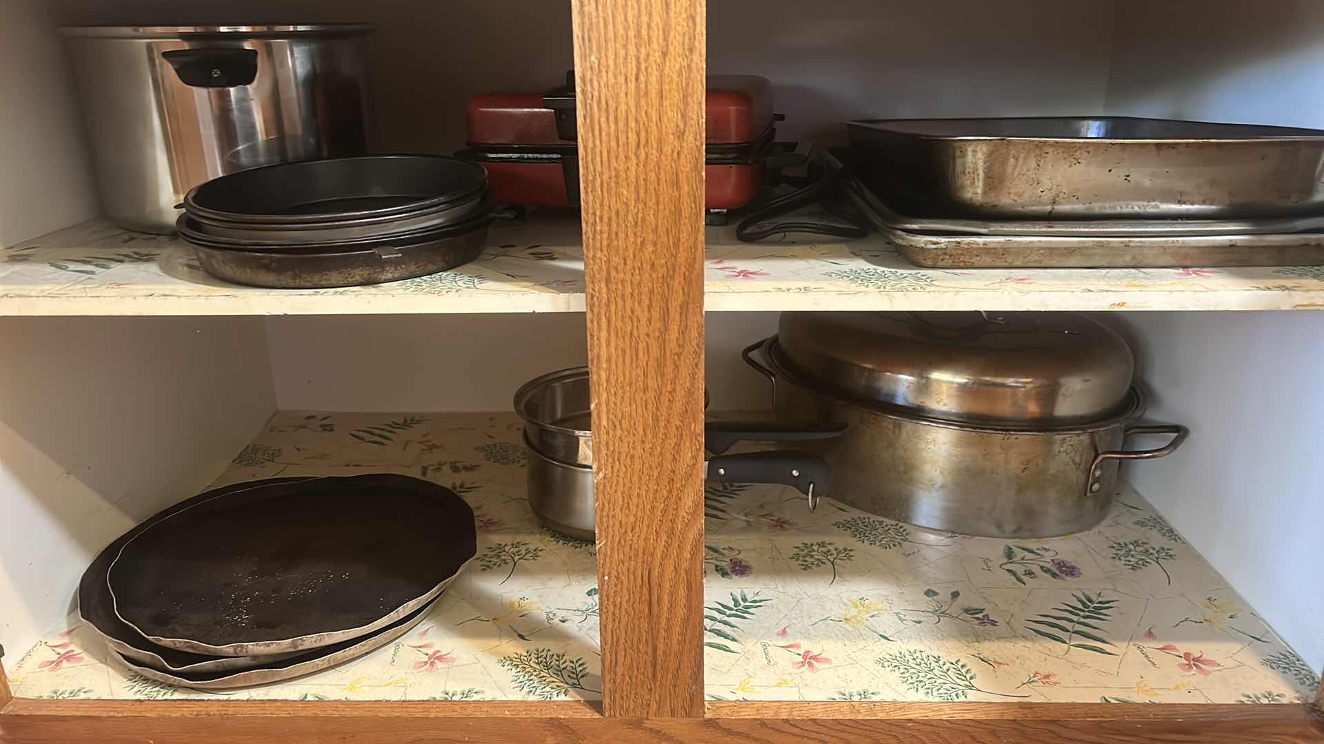 Photo 1 of CONTENTS OF KITCHEN CABINET