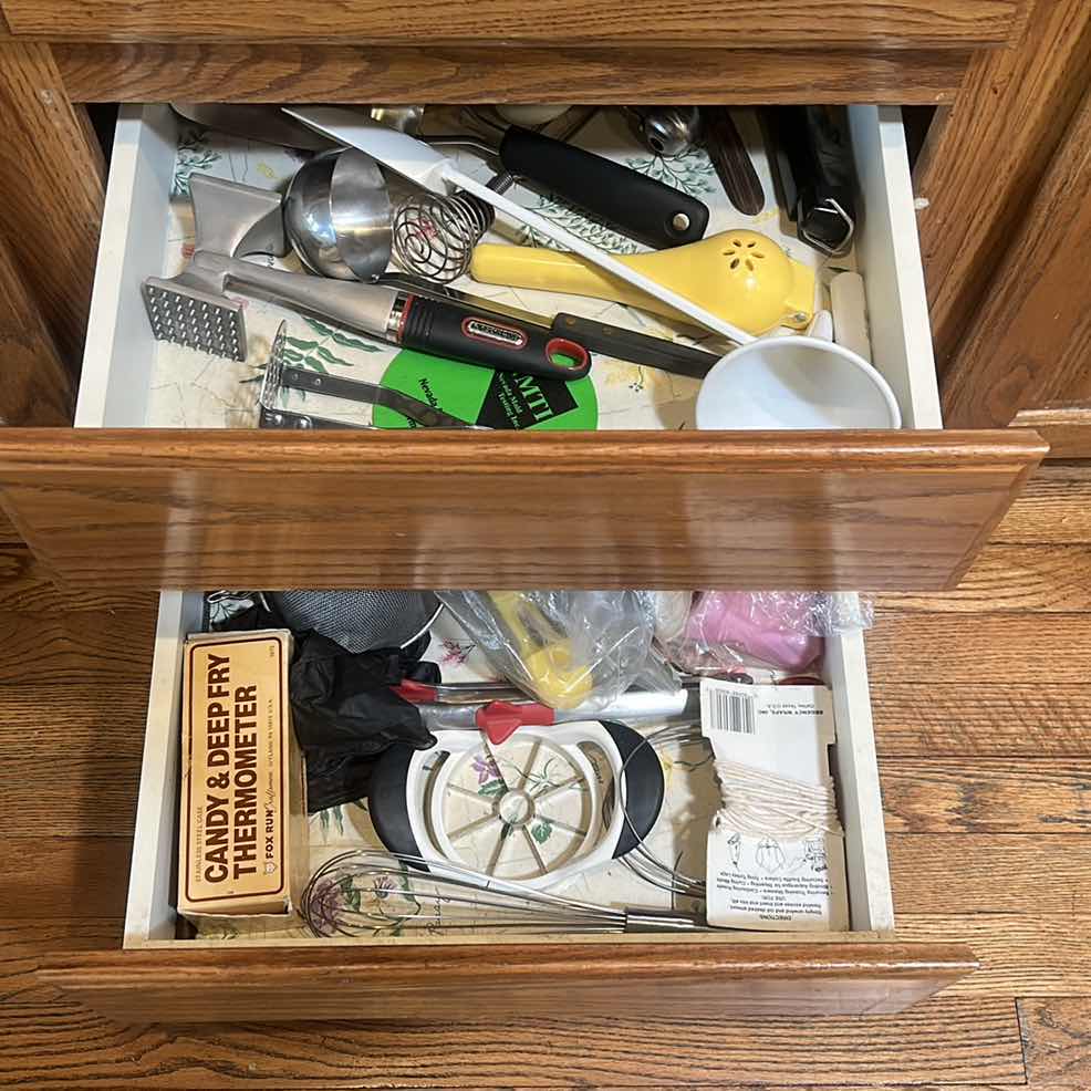 Photo 1 of CONTENTS OF 2 PULL OUT DRAWERS IN KITCHEN