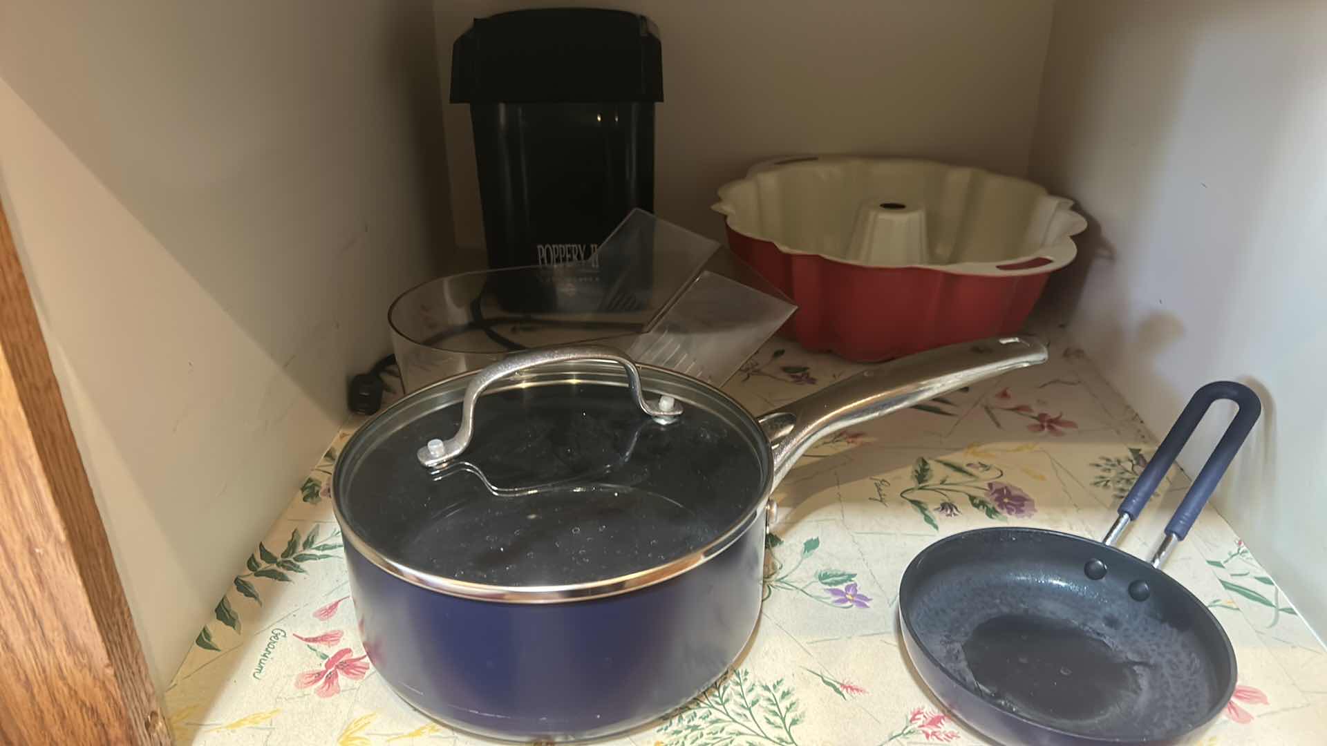 Photo 1 of CONTENTS OF KITCHEN CABINET