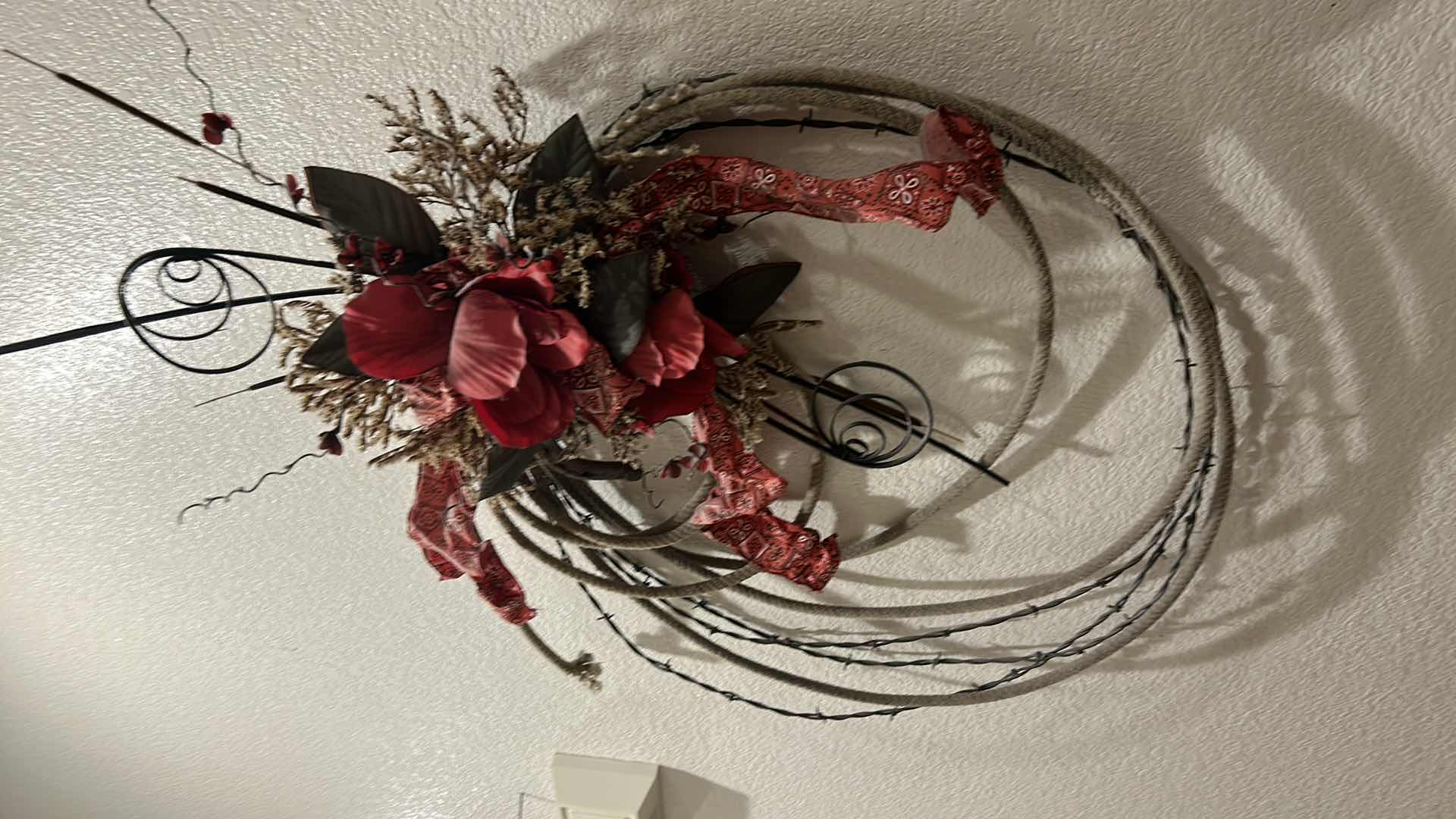 Photo 1 of BARBWIRE AND LASSO WREATH 36” x 28”
