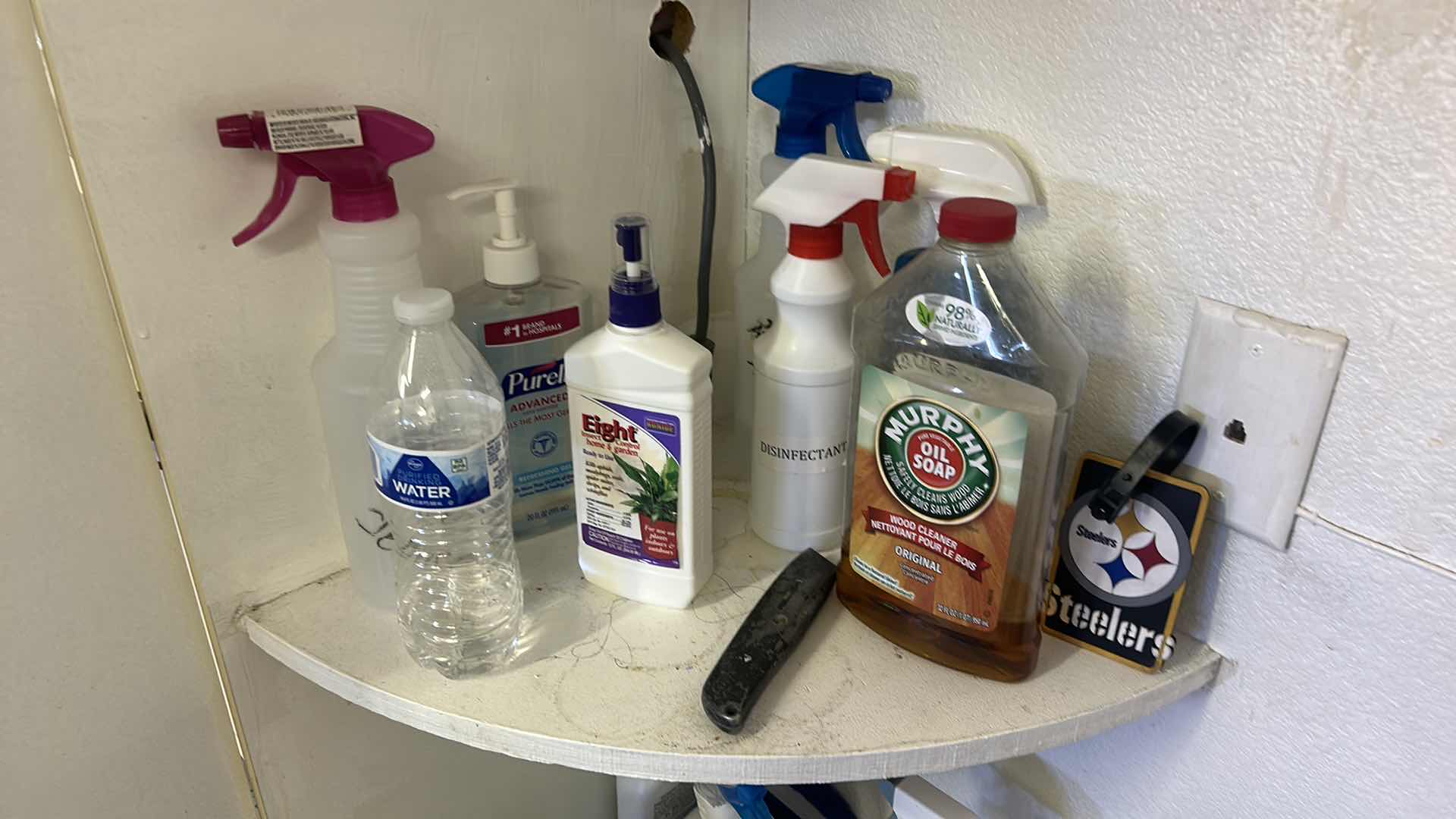 Photo 1 of CONTENTS OF CORNER SHELVES IN GARAGE