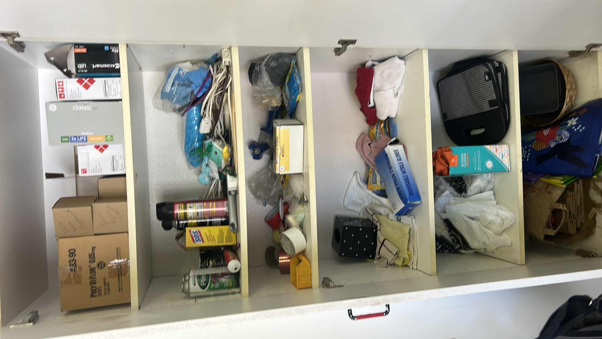 Photo 1 of CONTENTS OF CABINET IN GARAGE