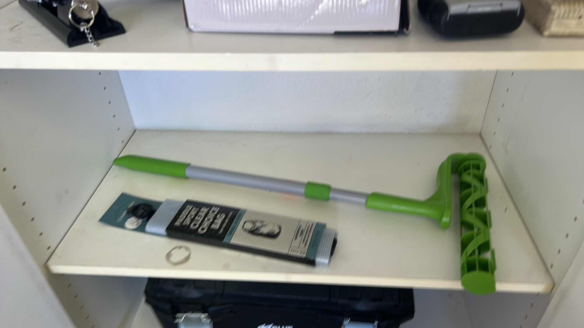 Photo 1 of CONTENTS OF CABINET IN GARAGE