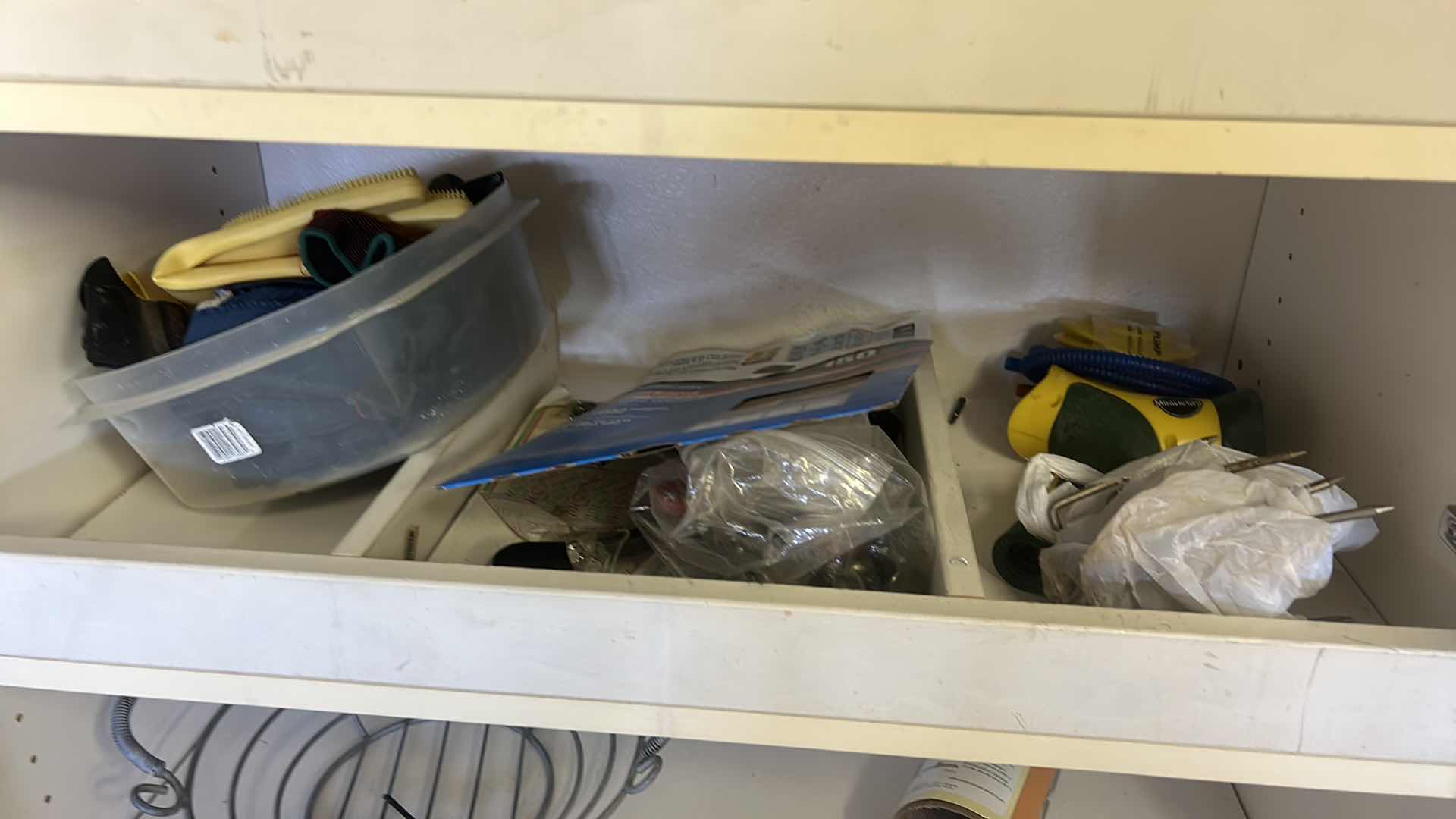 Photo 1 of CONTENTS OF CABINET IN GARAGE