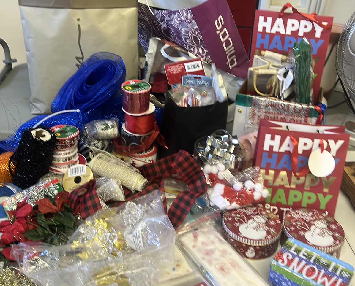 Photo 1 of CHRISTMAS GIFT WRAP AND ACCESSORIES ASSORTMENT