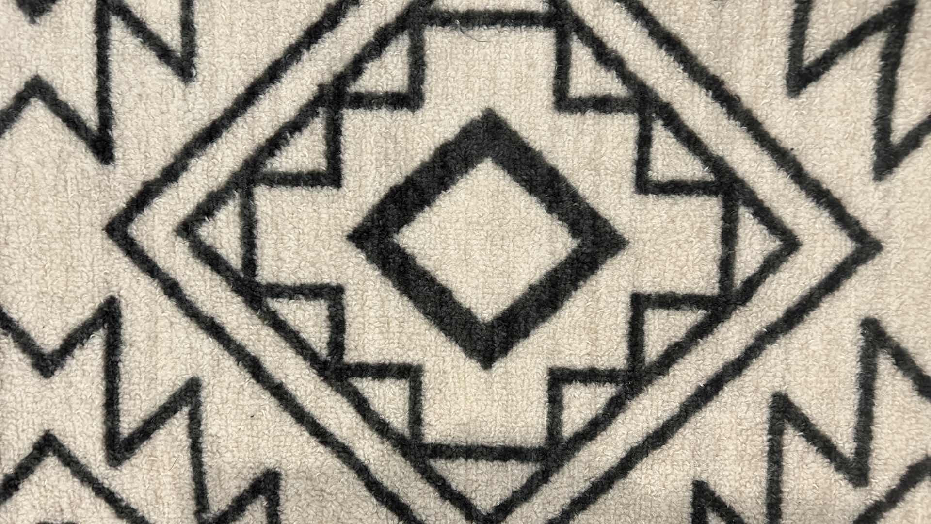 Photo 1 of OFF-WHITE AND BLACK AREA RUG 7‘ x 10‘