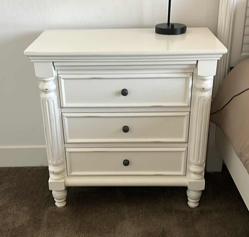 Photo 1 of WHITE 3 DRAWER SLIGHTLY DISTRESSED NIGHTSTAND (LAMP SOLD SEPARATELY) 33” x 19” x 32 1/2”