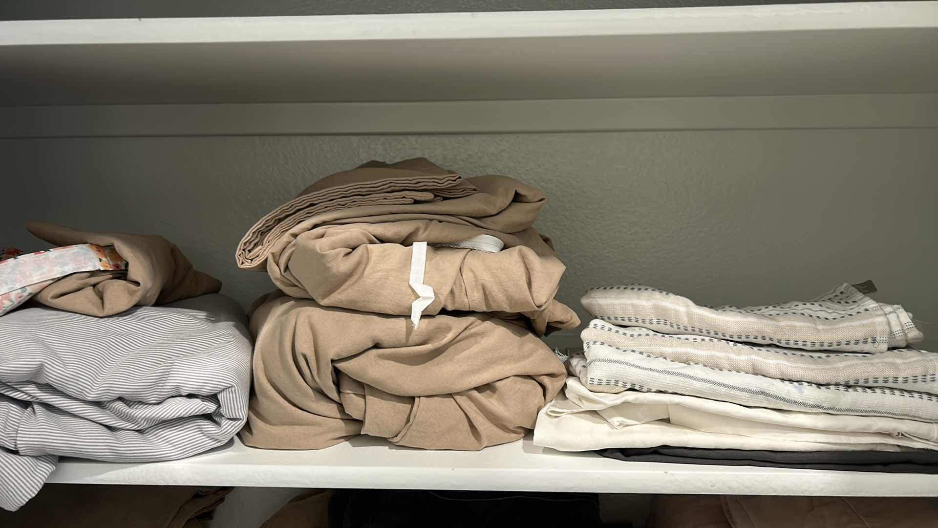 Photo 1 of CONTENTS OF LINEN CLOSET UPSTAIRS