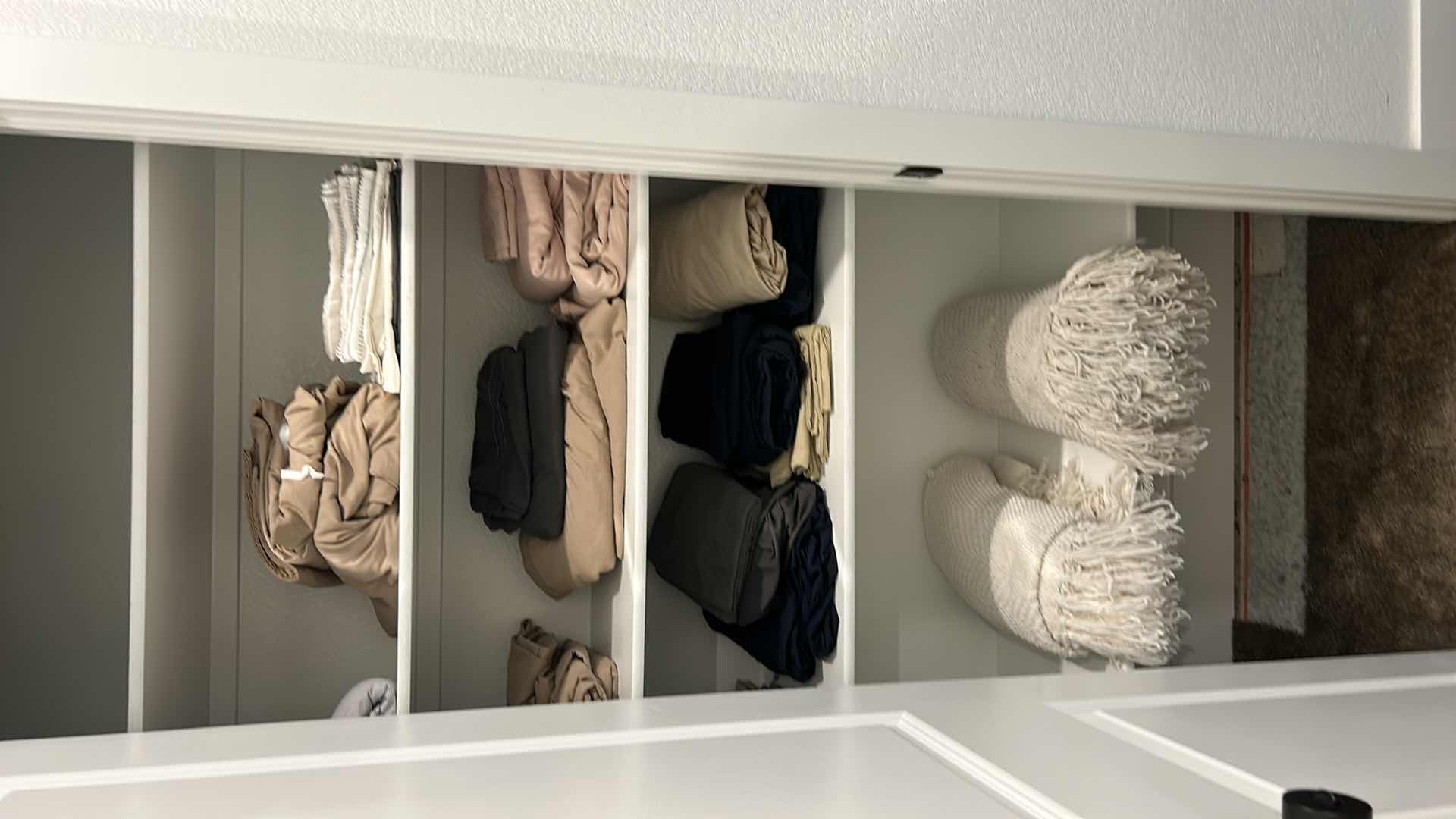 Photo 1 of CONTENTS OF LINEN CLOSET UPSTAIRS