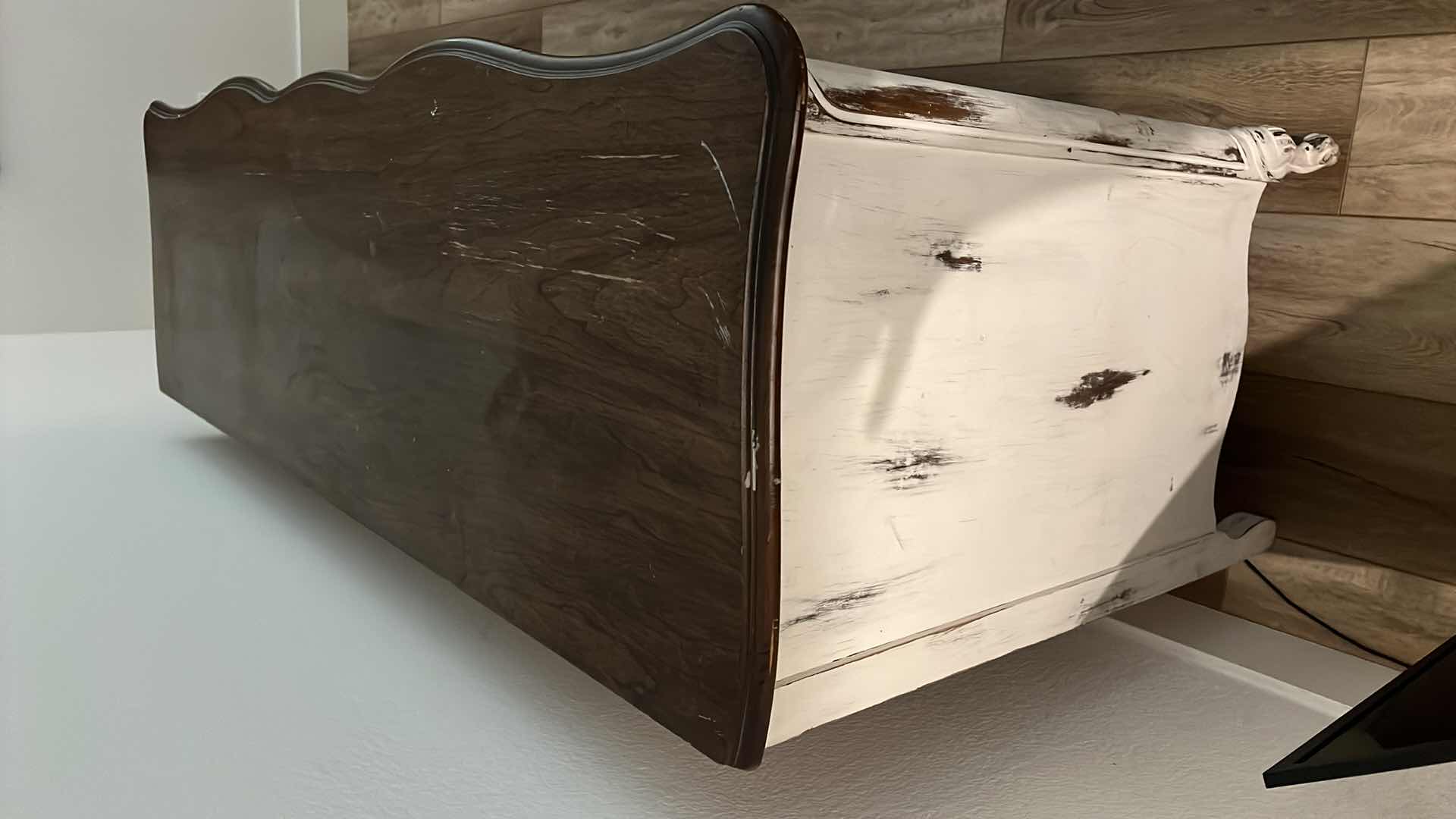 Photo 1 of FURNITURE-WHITE DISTRESSED WOOD DRESSER WITH 9 DRAWERS. 58“ x 20“ x 29“.