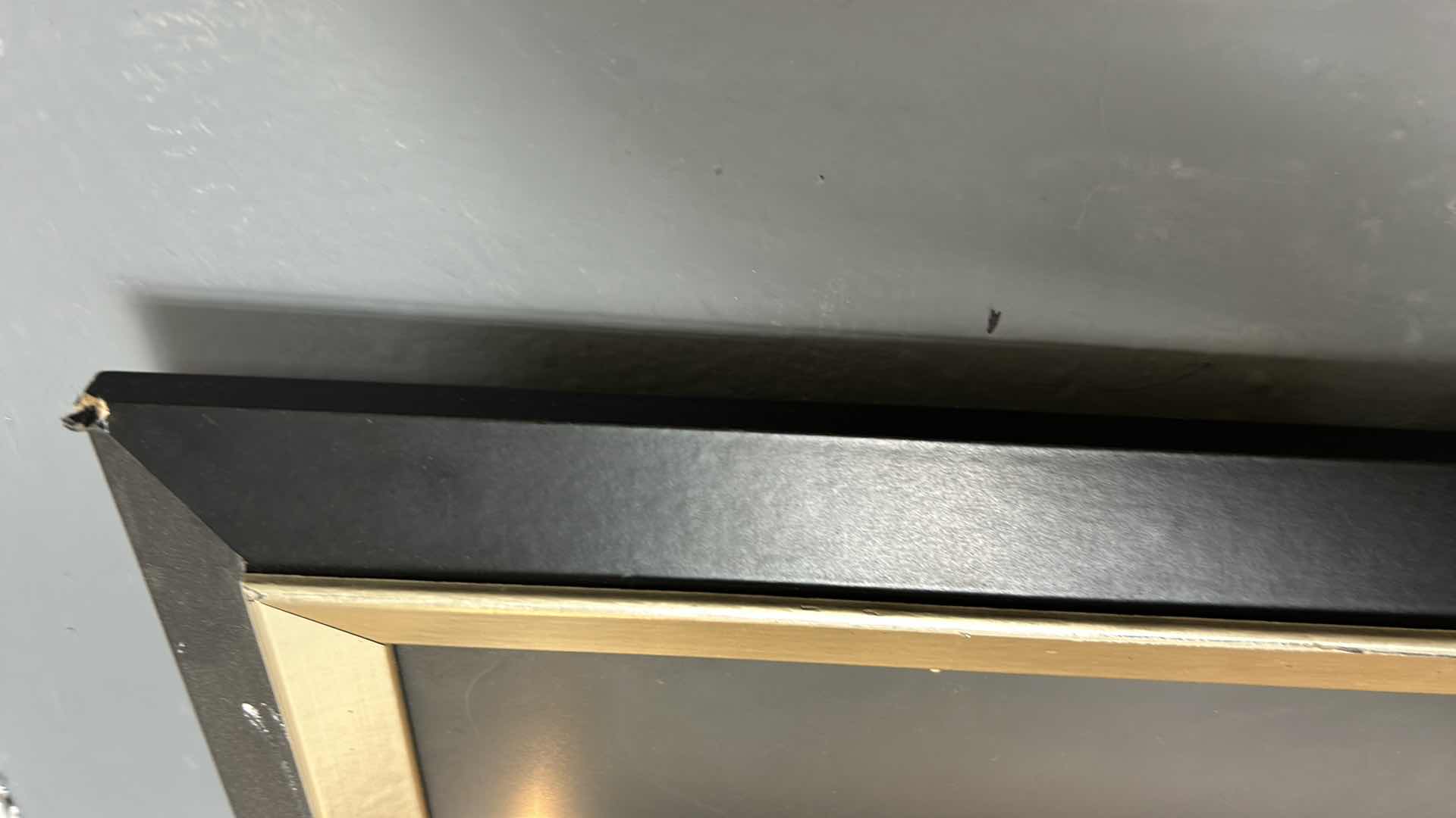 Photo 1 of BLACK AND GOLD FRAMED PRINT. “BLACK FISHNET STOCKINGS” ARTWORK 19" X H35.5".