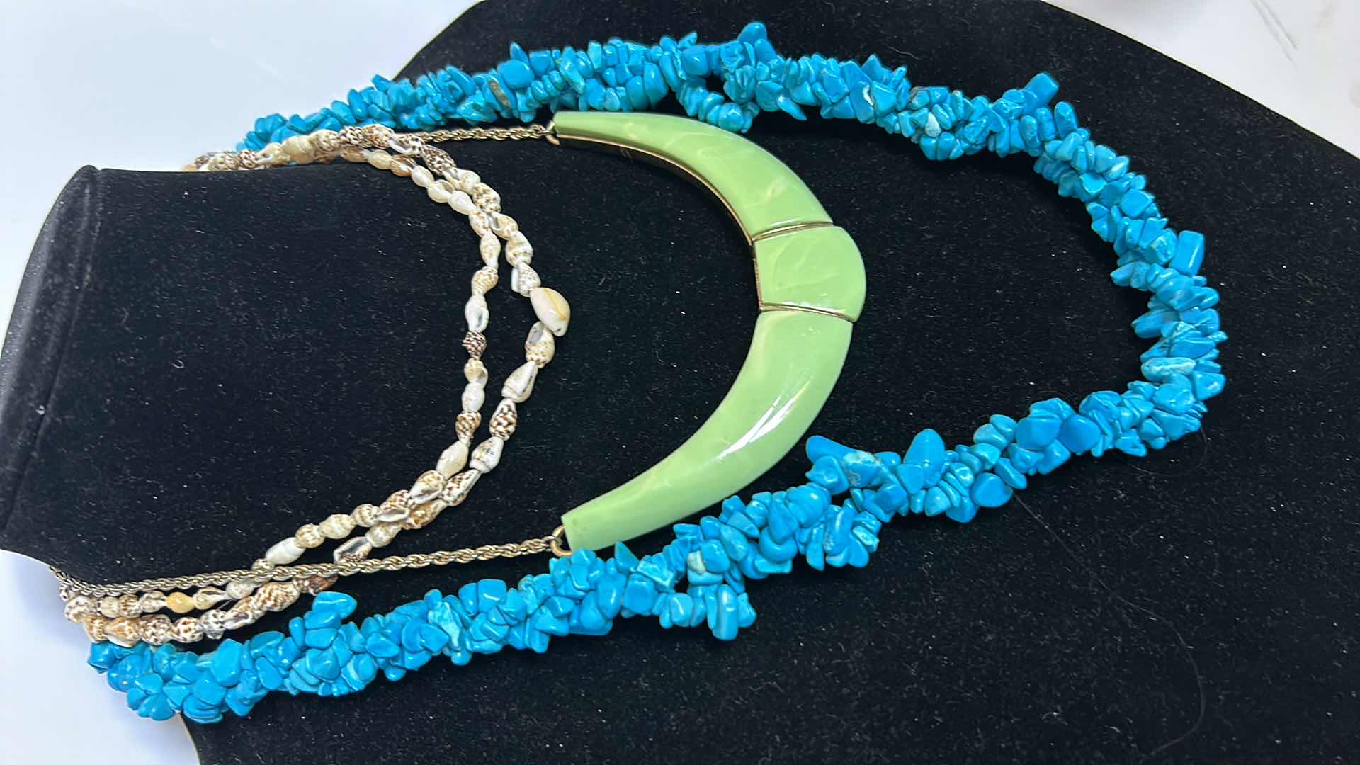 Photo 1 of COSTUME JEWELRY- 3 NECKLACES, 1 PAIR OF EARRINGS.